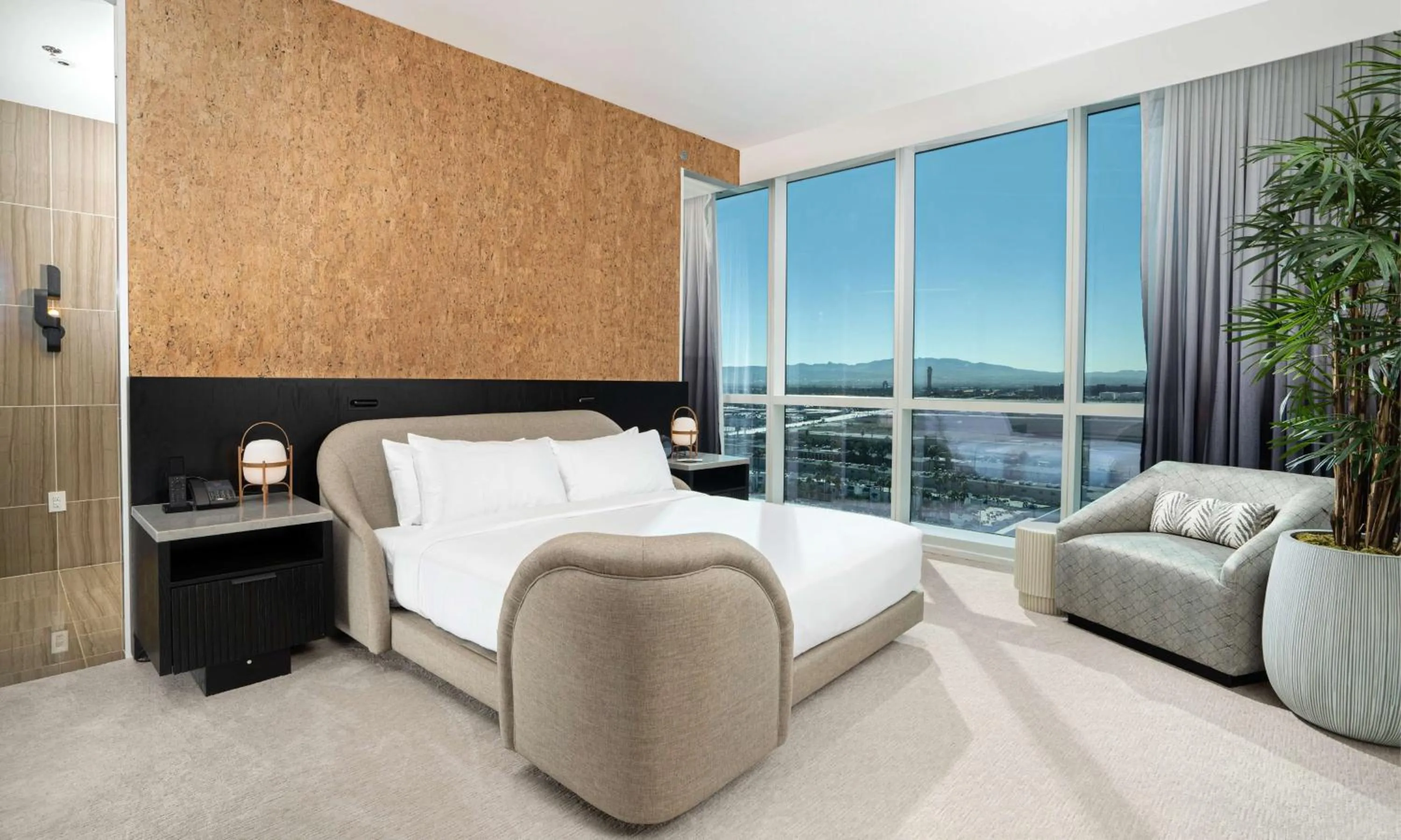 Living room, Bed in Virgin Hotels Las Vegas, Curio Collection by Hilton