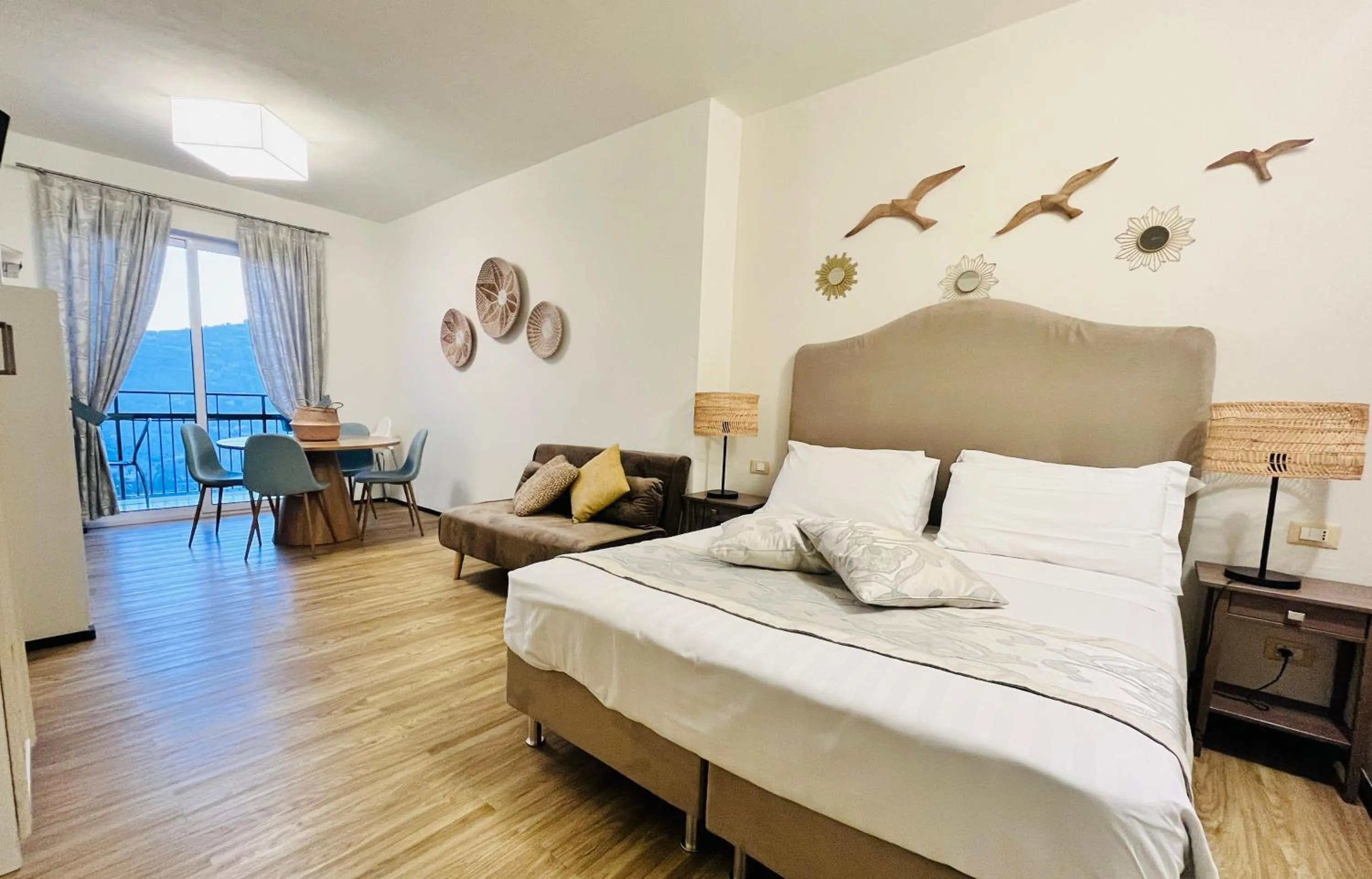 Living room, Bed in Villa Giada Resort