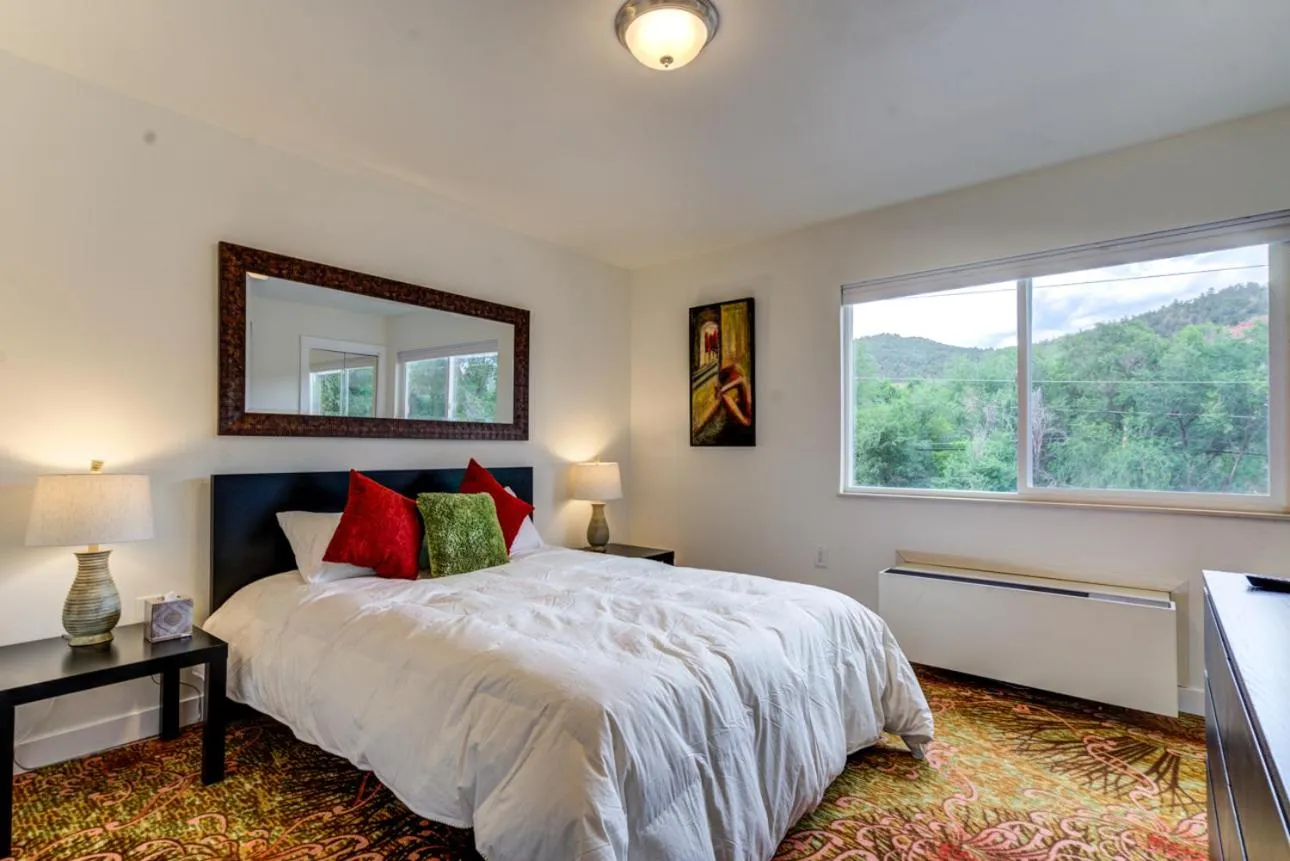 Bed in INNhale Resort and Spa