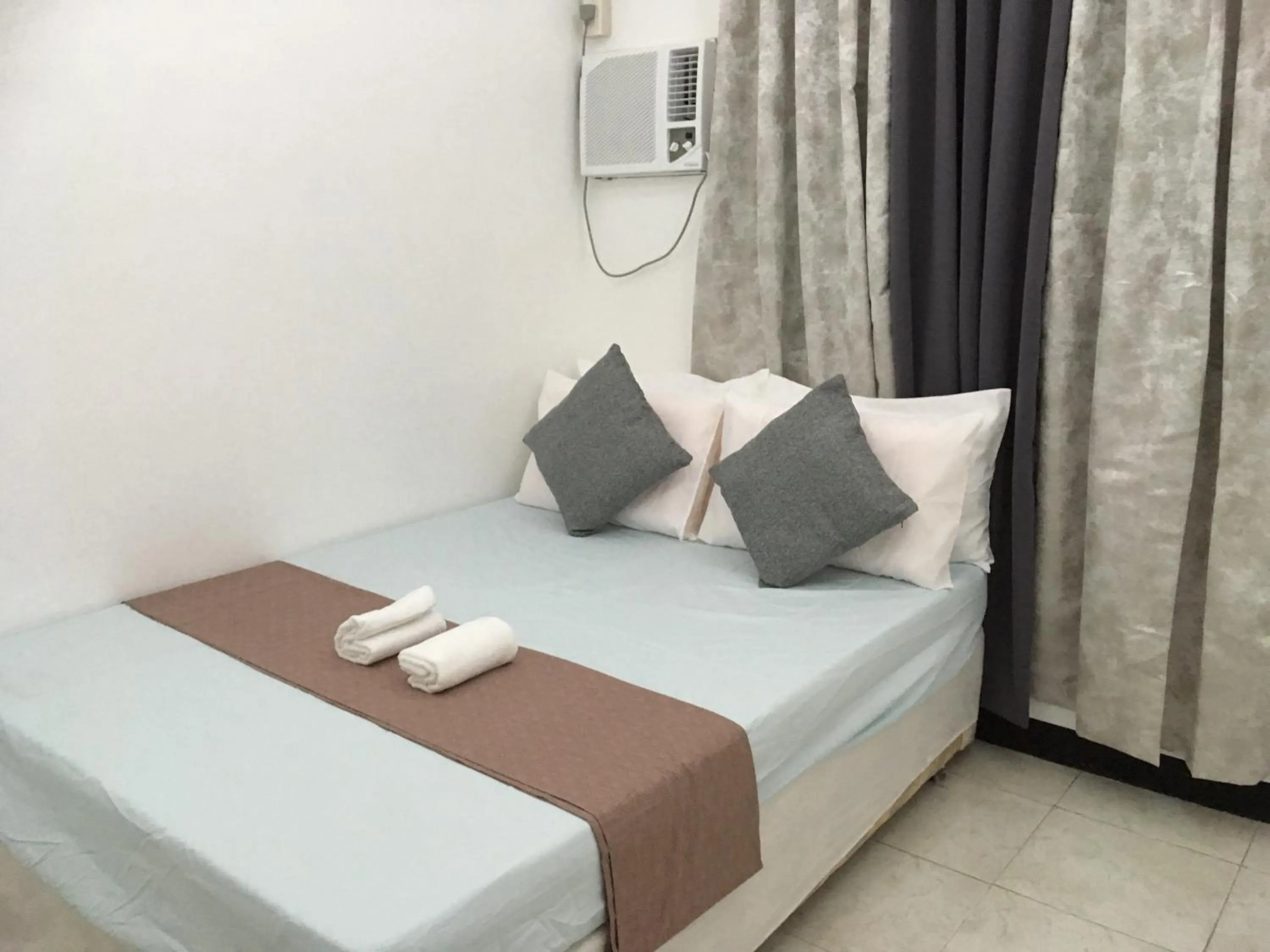 Bed in Bolinao Transient House A