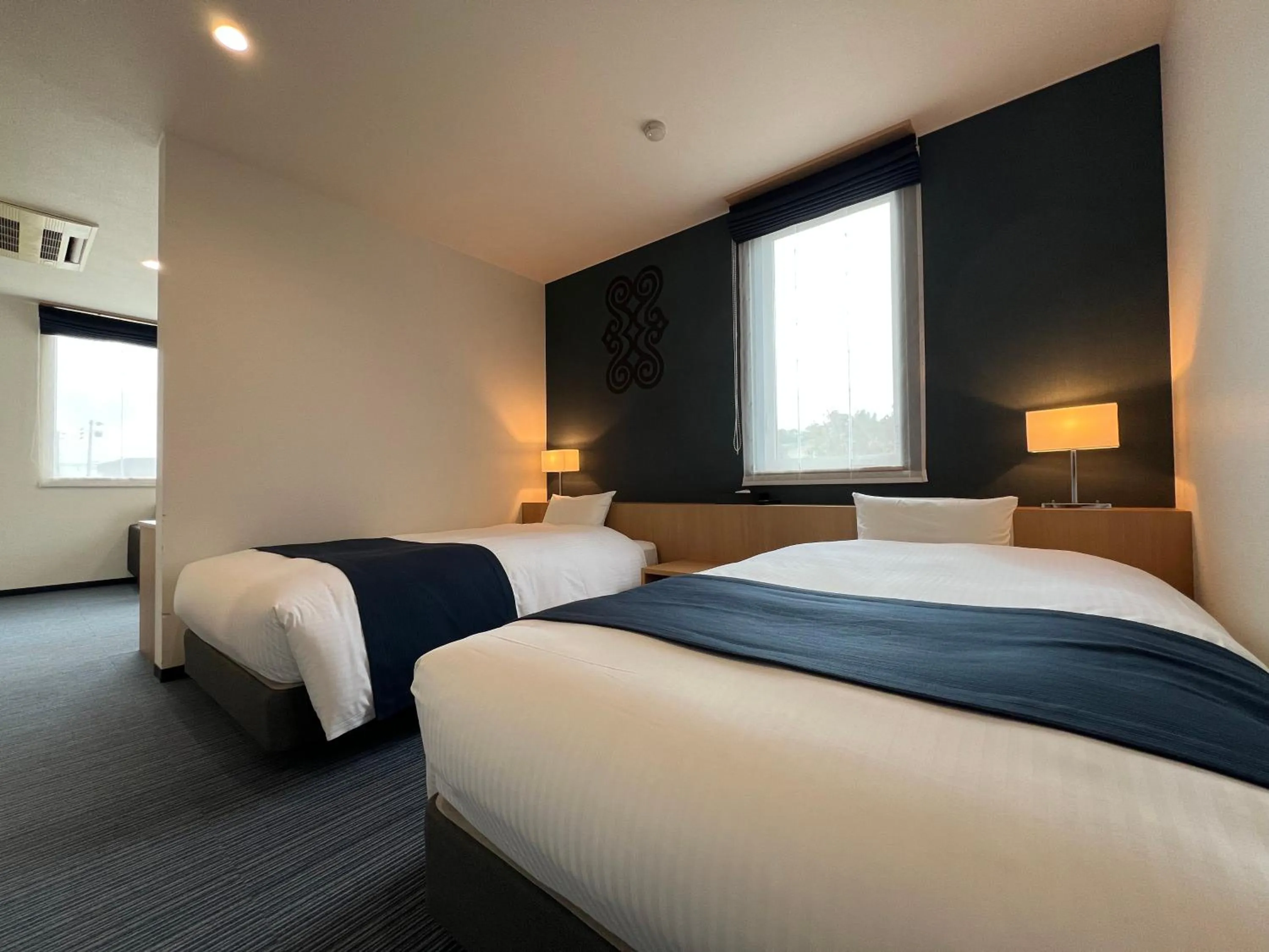 Bed in Hotel REUS Ashoro