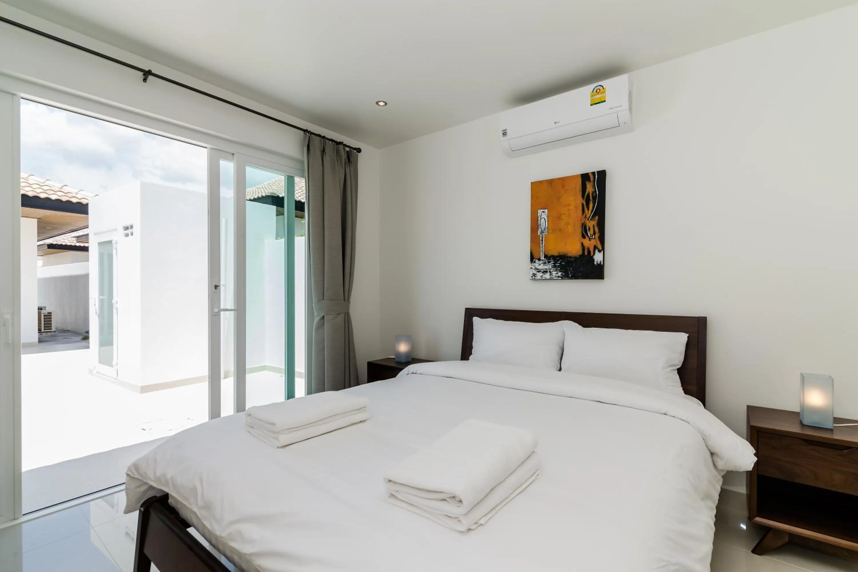 Bed in Orchid Paradise Homes 325