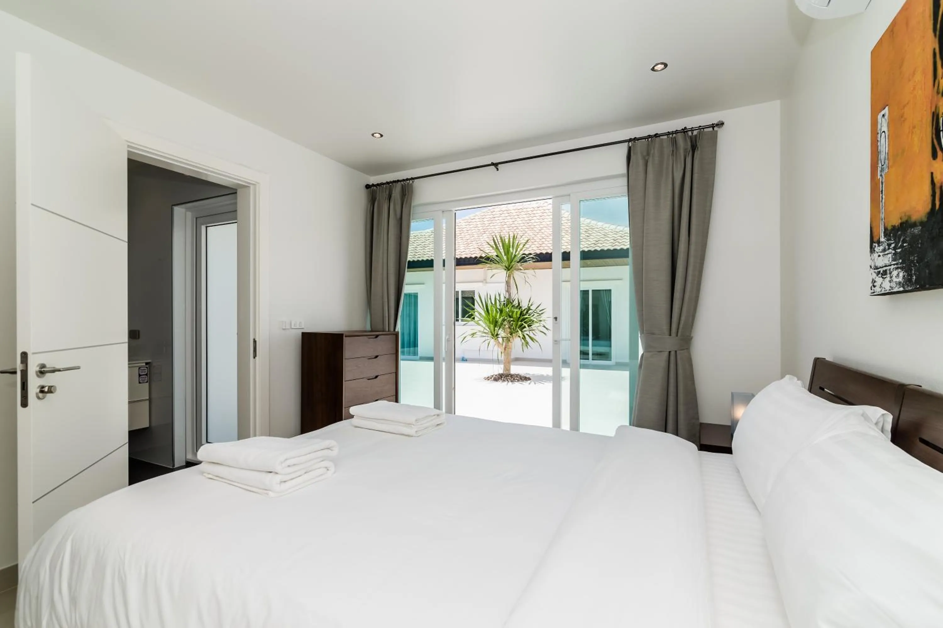 Bed in Orchid Paradise Homes 325