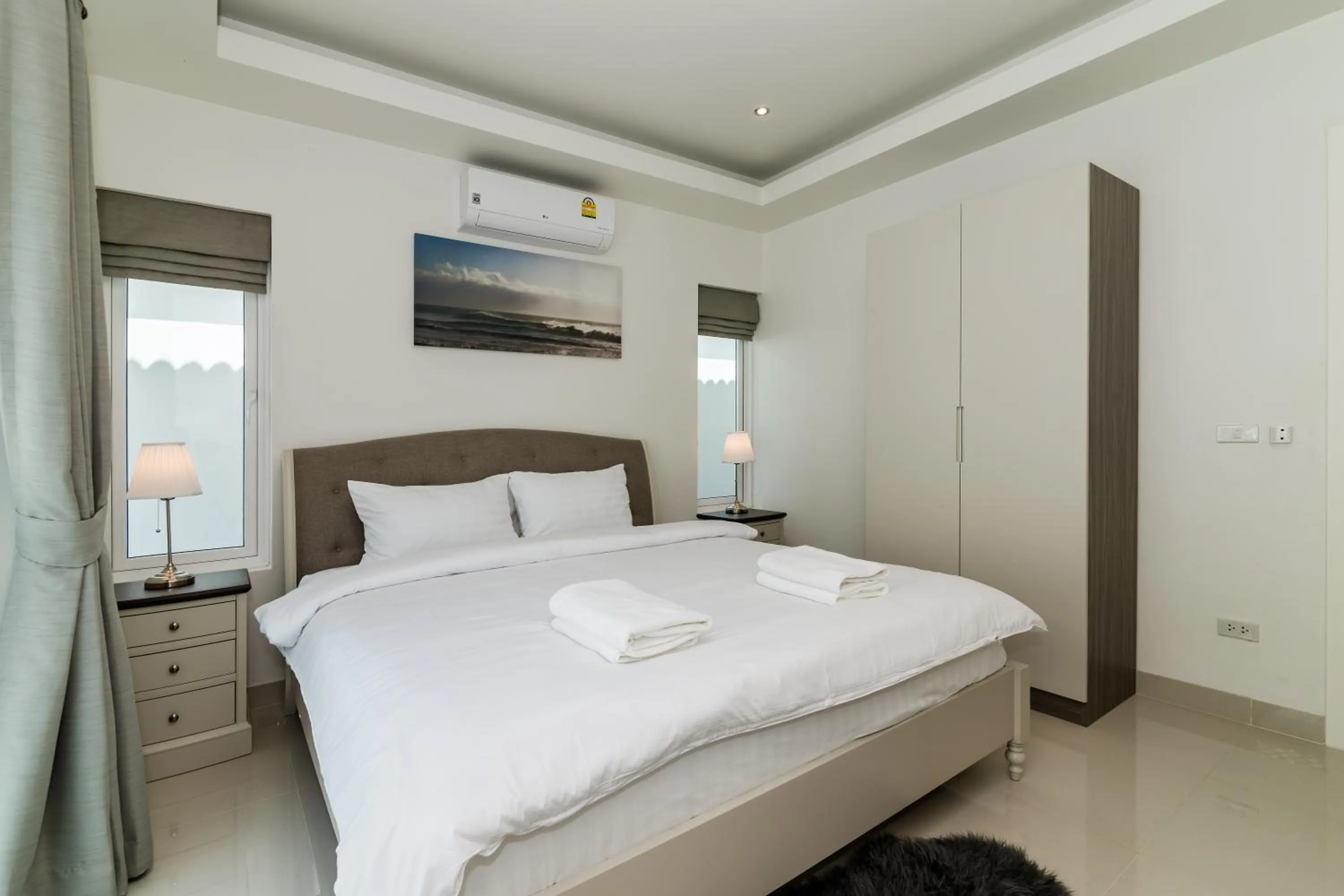Bed in Orchid Paradise Homes 325