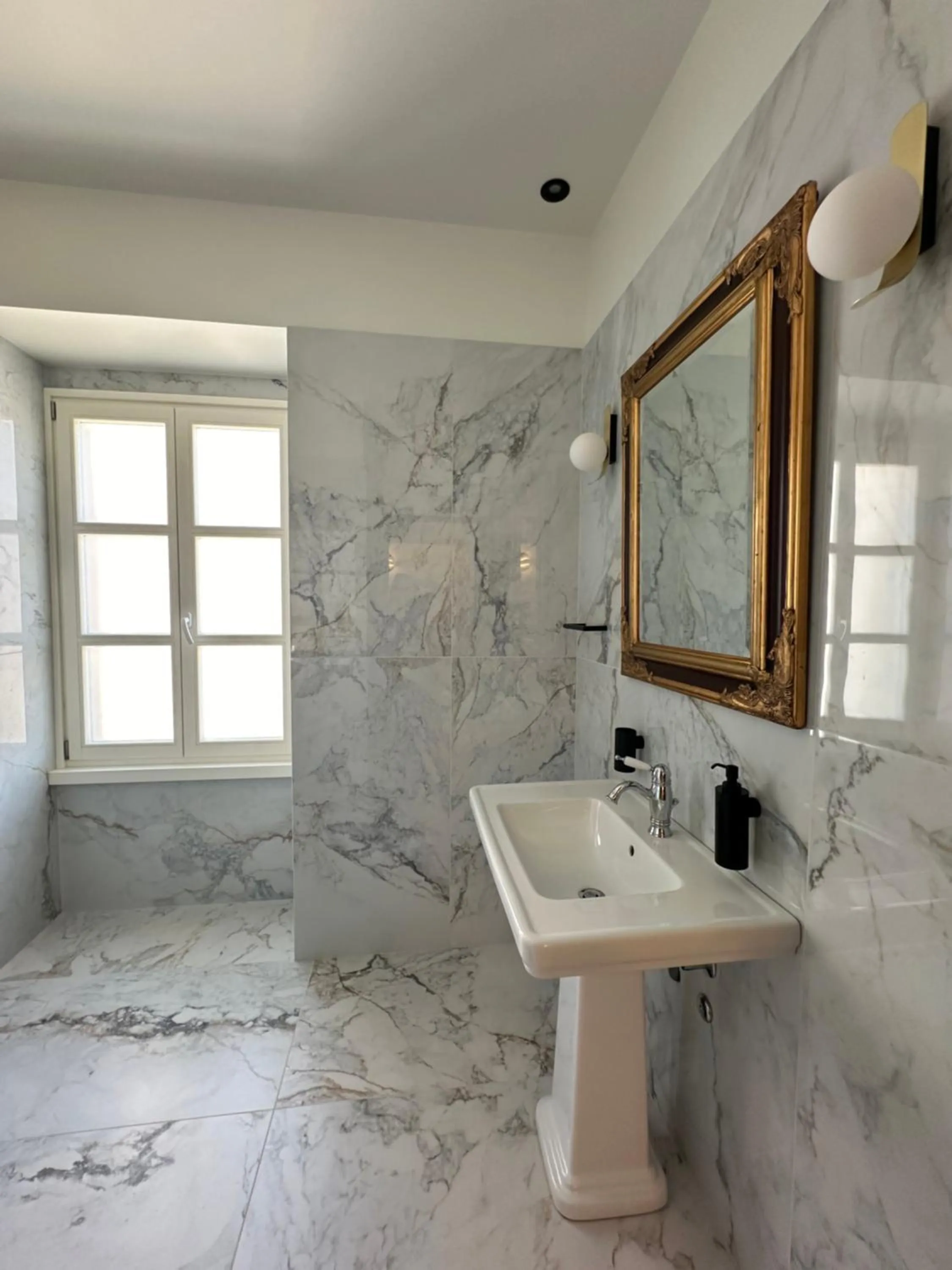 Bathroom in Castellano Hotel & Suites