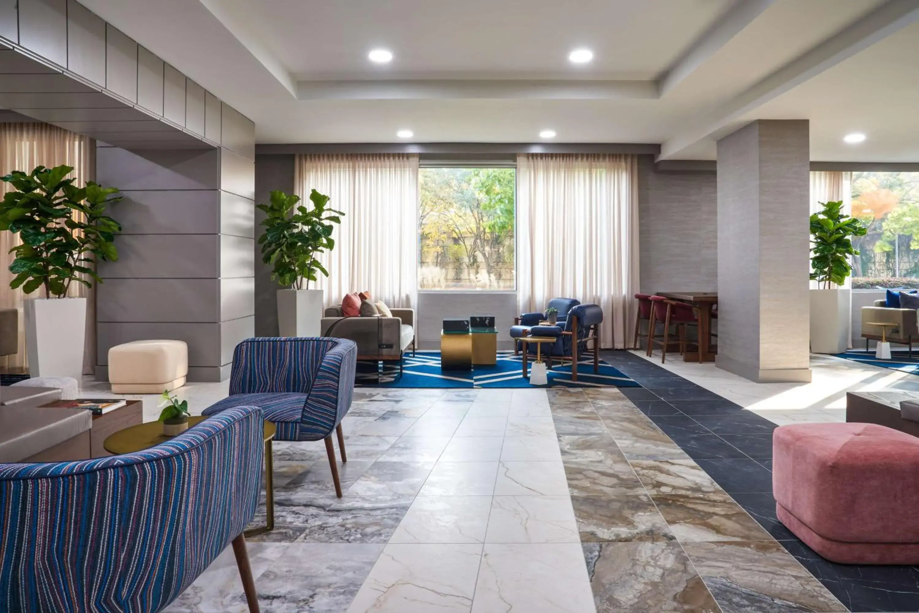 Lobby or reception in The Chifley Houston, Tapestry Collection by Hilton Lobby or reception in The Chifley Houston, Tapestry Collection by Hilton