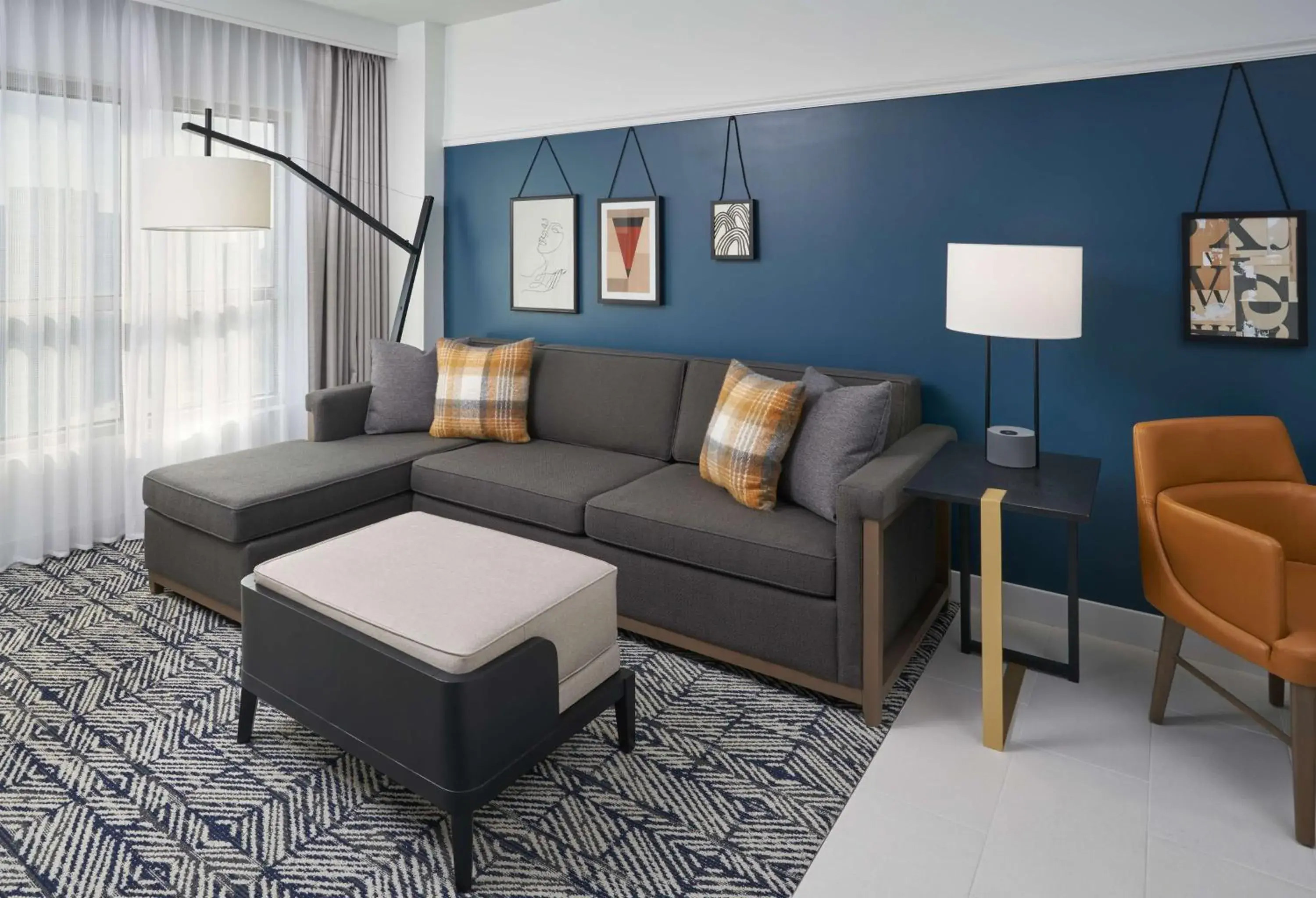 Living room in The Chifley Houston, Tapestry Collection by Hilton Living room in The Chifley Houston, Tapestry Collection by Hilton