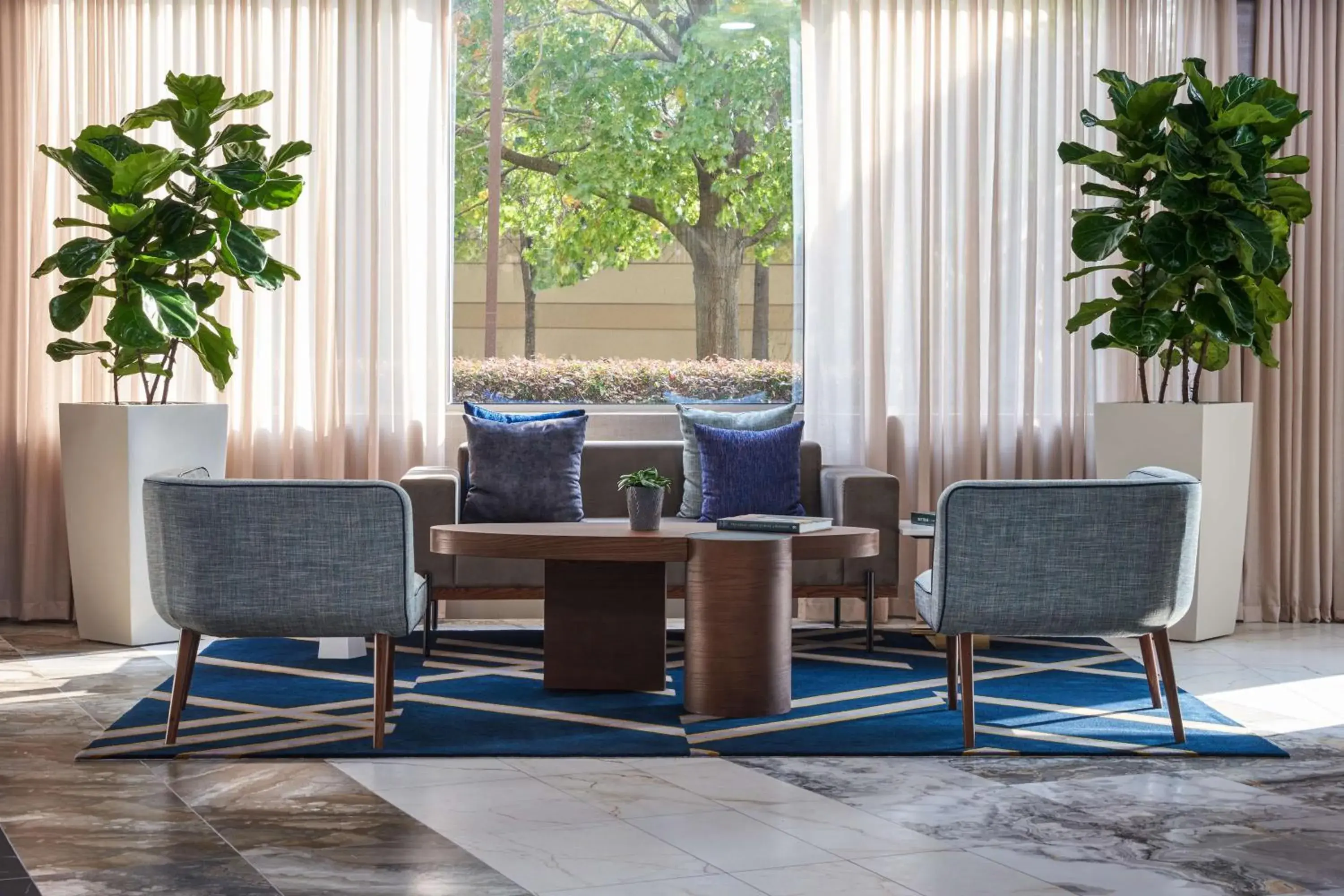 Lobby or reception in The Chifley Houston, Tapestry Collection by Hilton Lobby or reception in The Chifley Houston, Tapestry Collection by Hilton