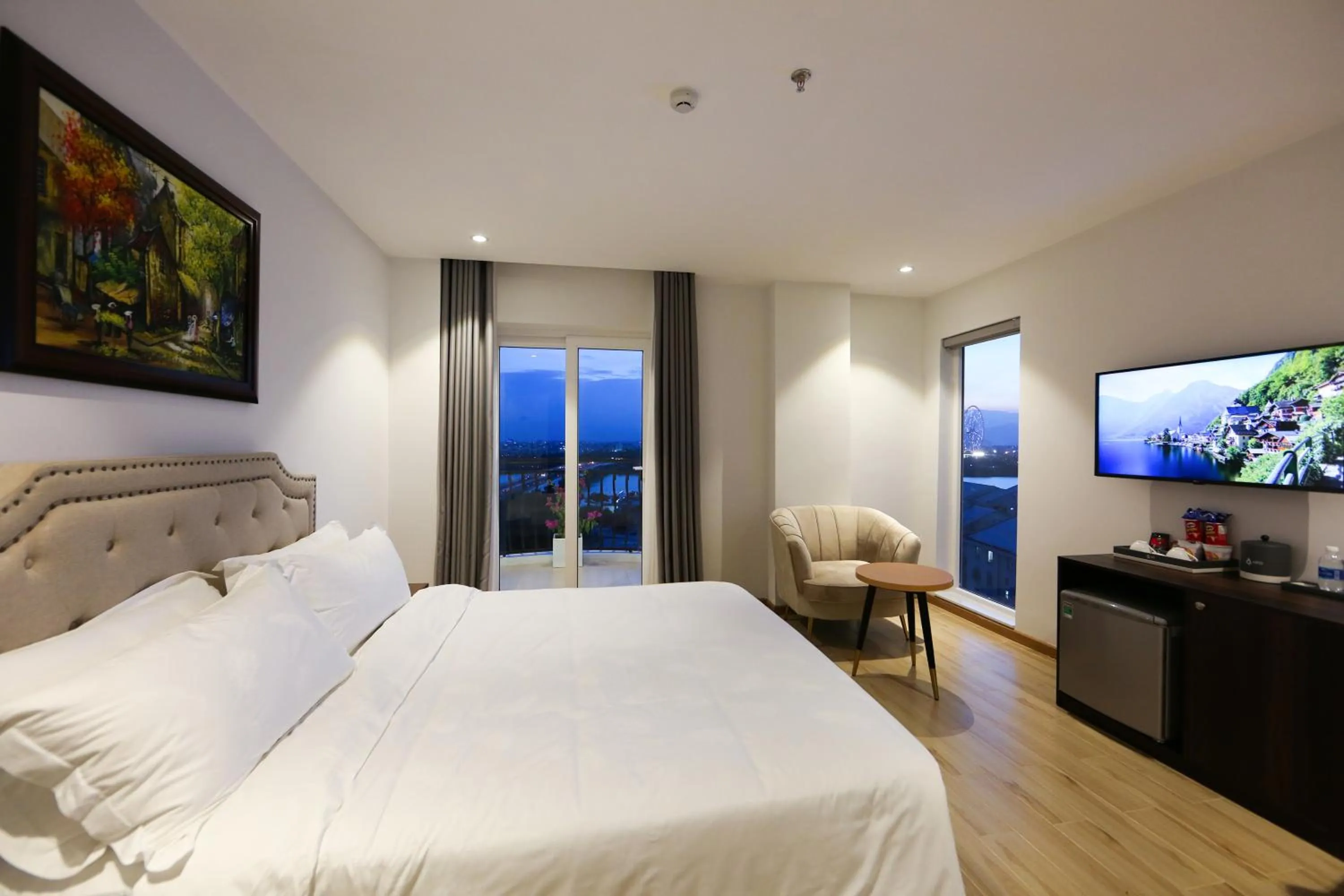 Bed in RHM Luxury Hotel And Suite