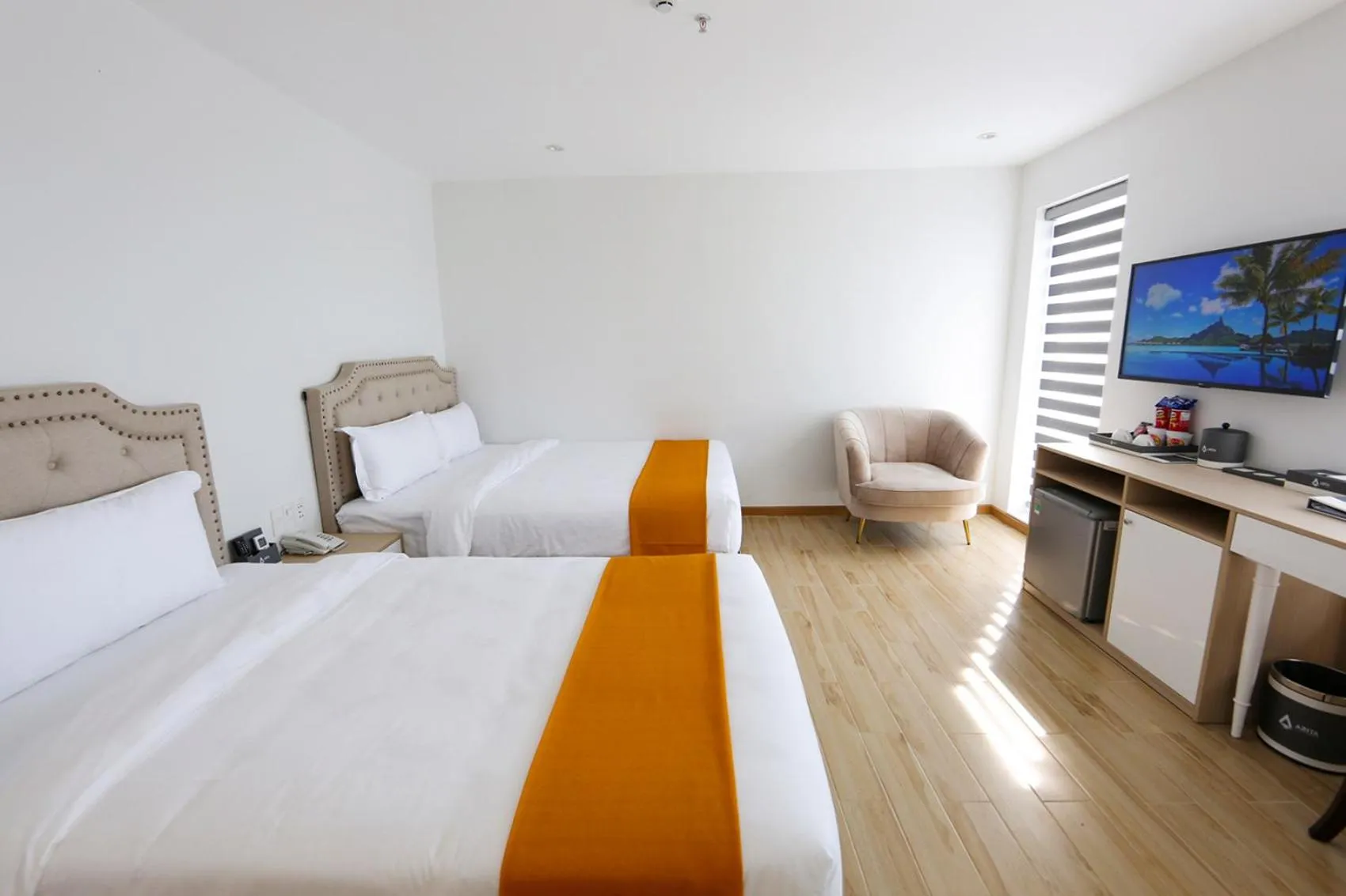 Bed in RHM Luxury Hotel And Suite