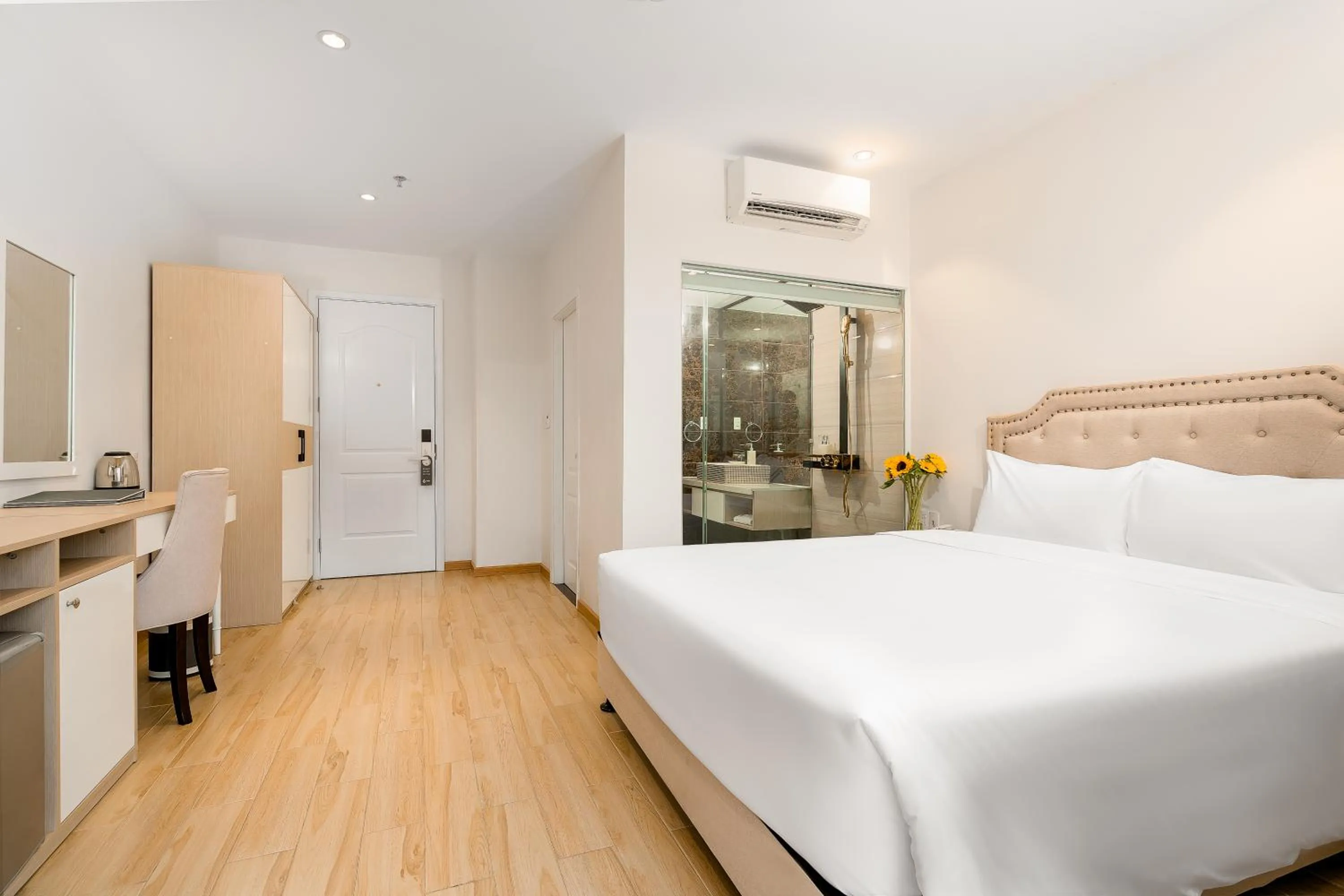 Bed in RHM Luxury Hotel And Suite