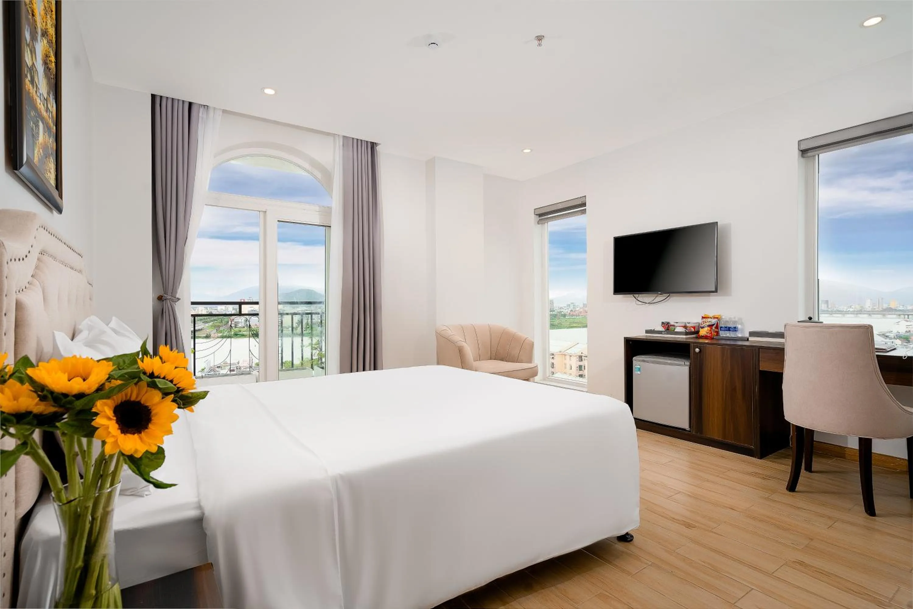 Bed in RHM Luxury Hotel And Suite