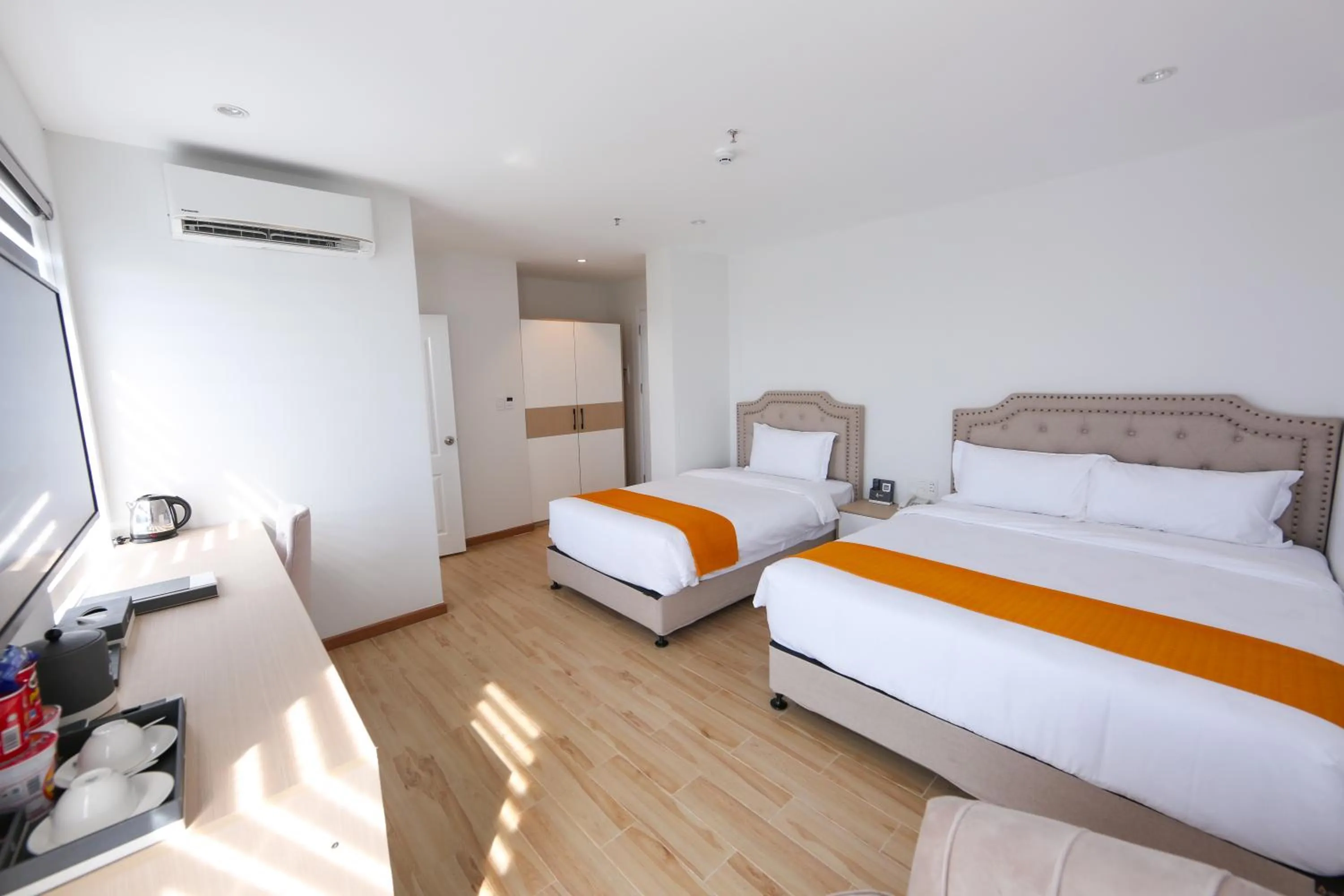 Bed in RHM Luxury Hotel And Suite