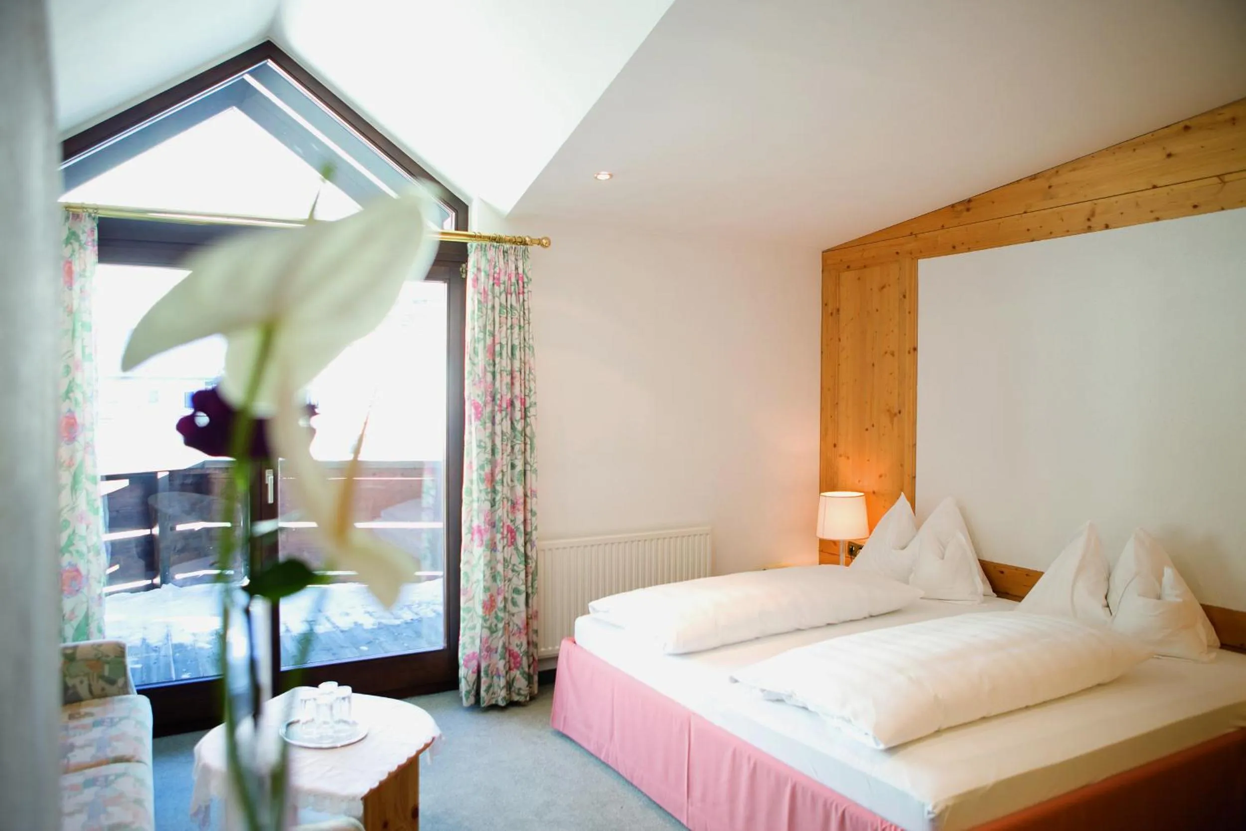 Bed in Hotel Angerer Alm