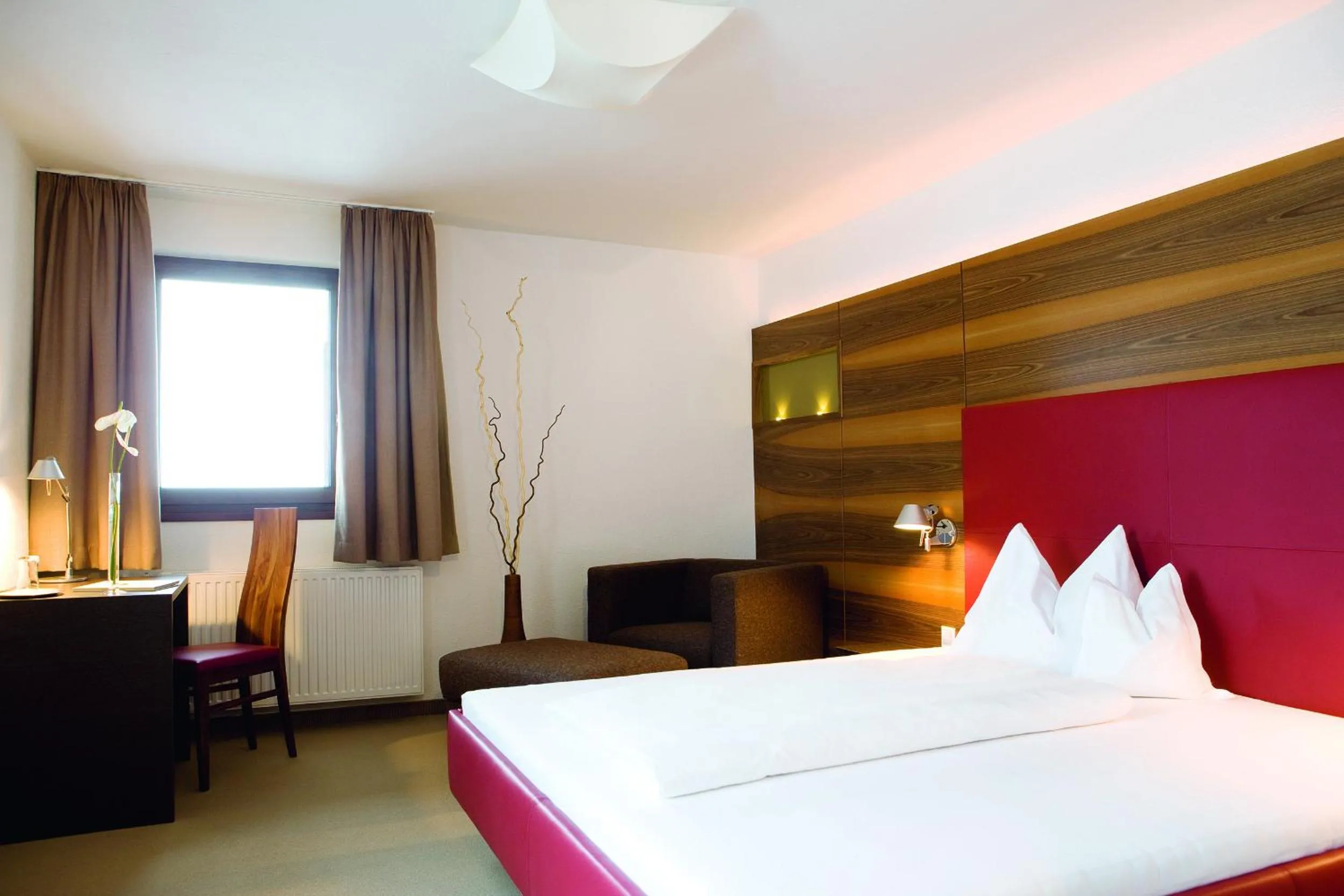 Bed in Hotel Angerer Alm