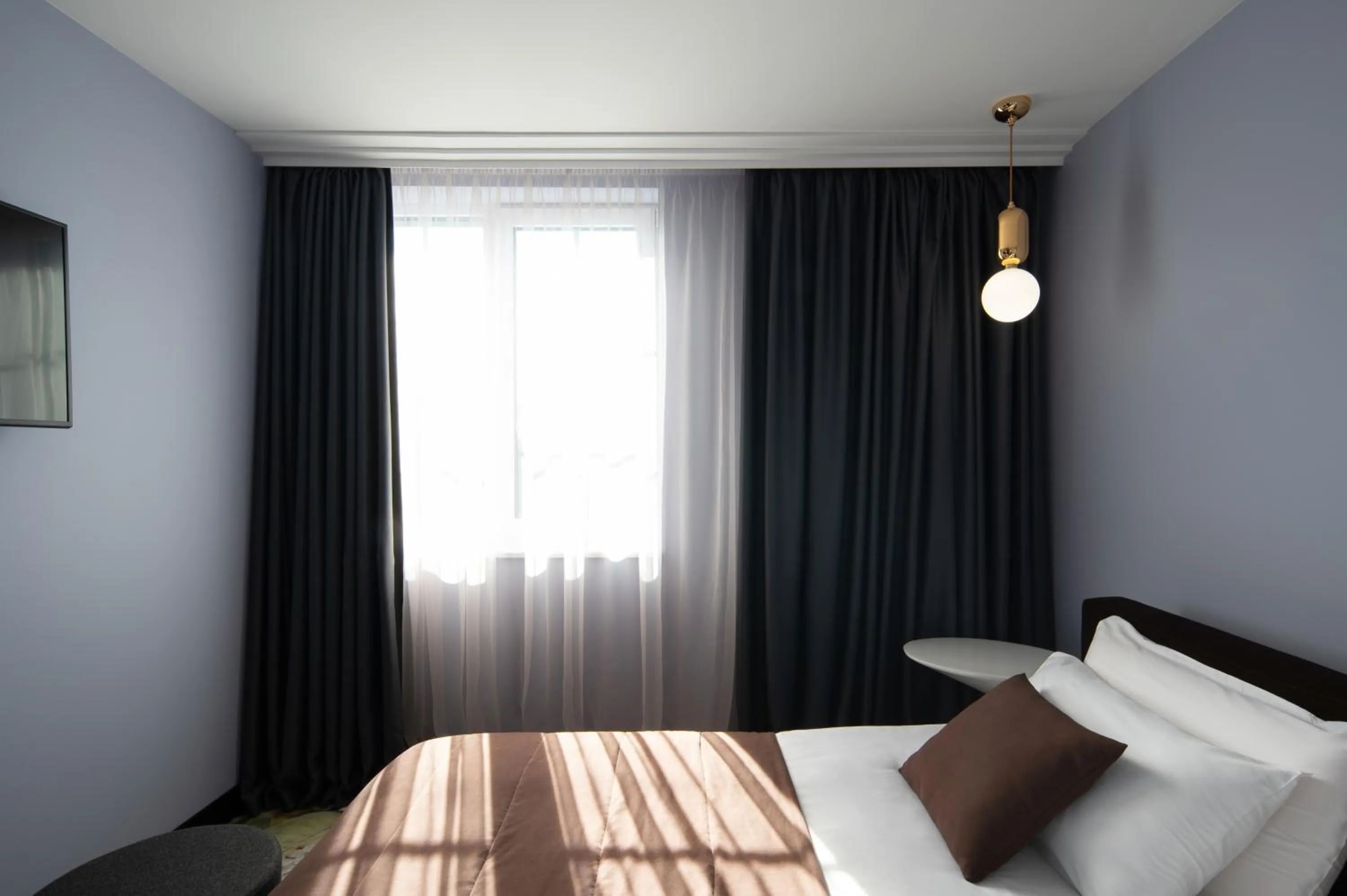Photo of the whole room, Bed in Amsterdam Plaza Hotel & SPA
