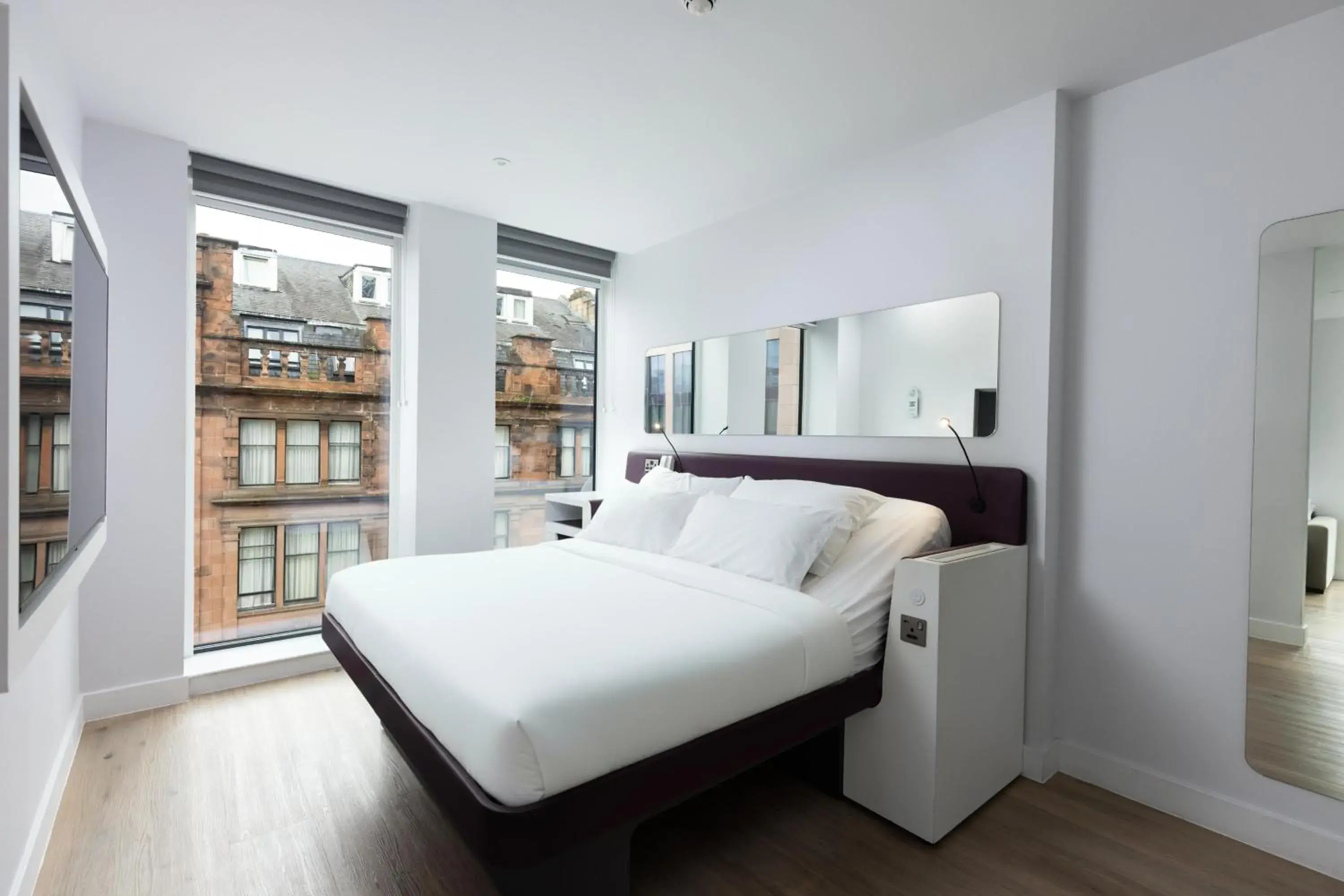 Photo of the whole room, Bed in YOTEL Glasgow Photo of the whole room, Bed in YOTEL Glasgow