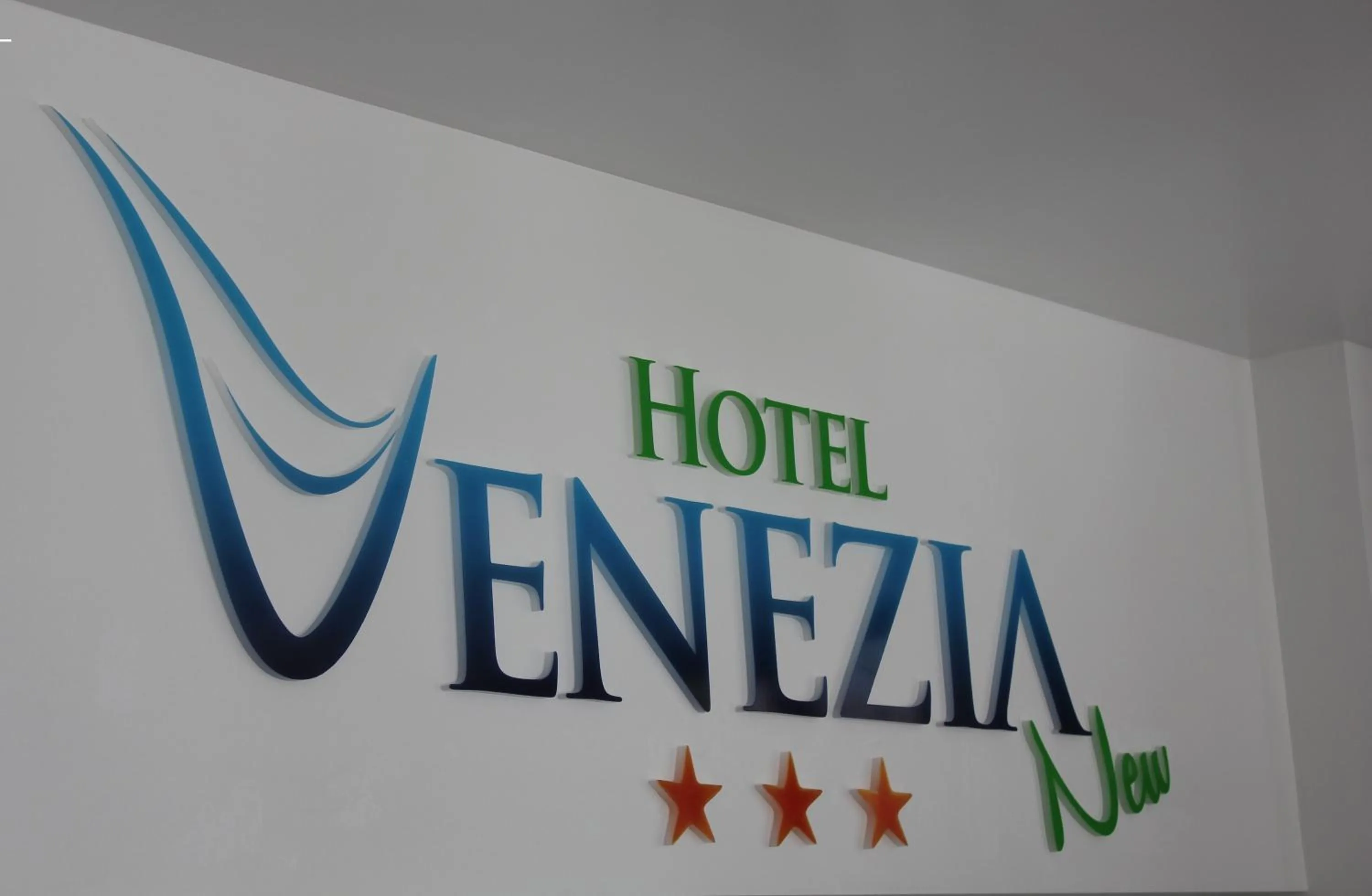 Property logo or sign in Hotel Venezia New