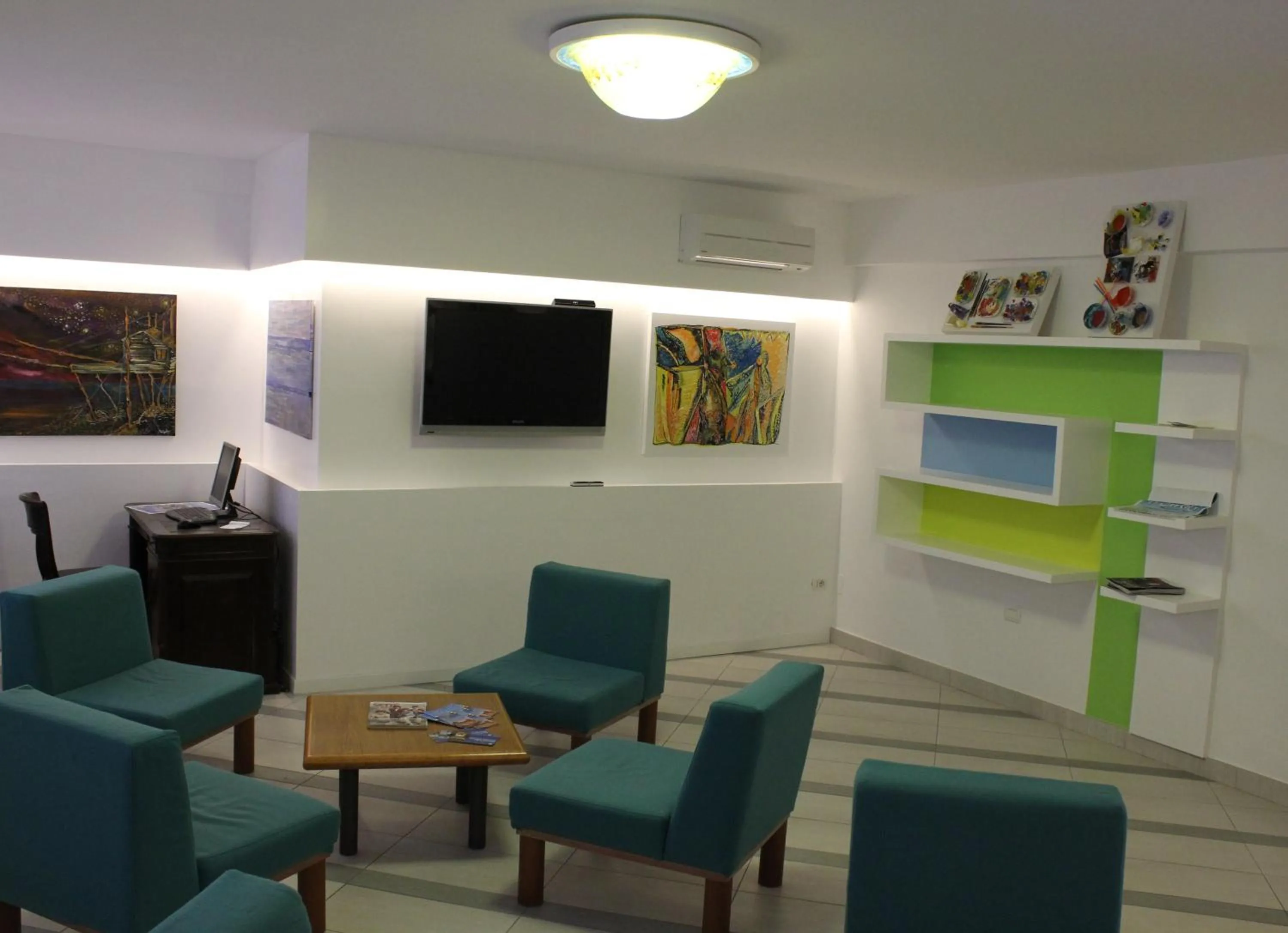 Communal lounge/ TV room in Hotel Venezia New