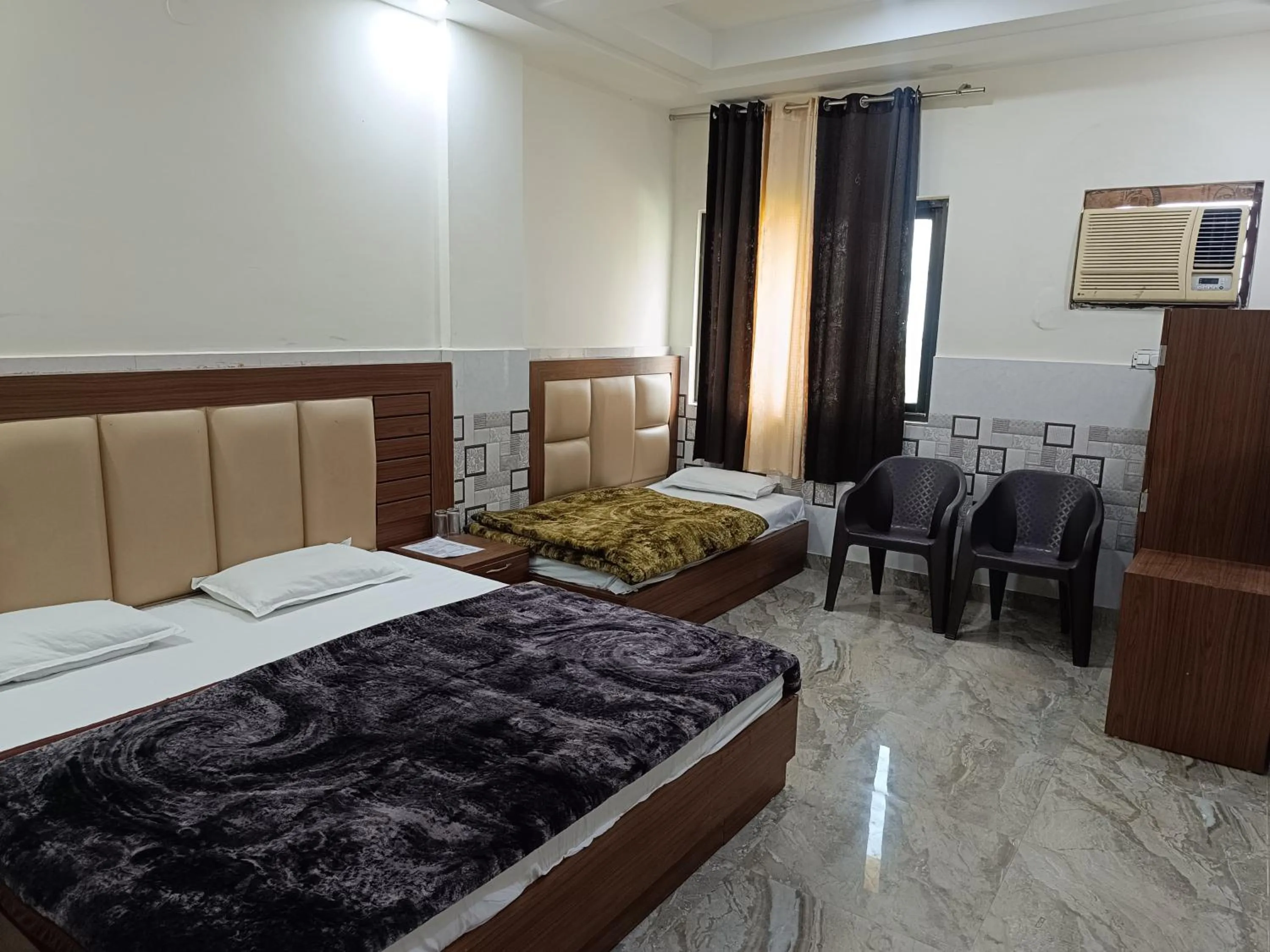 Bed in Abrol residency