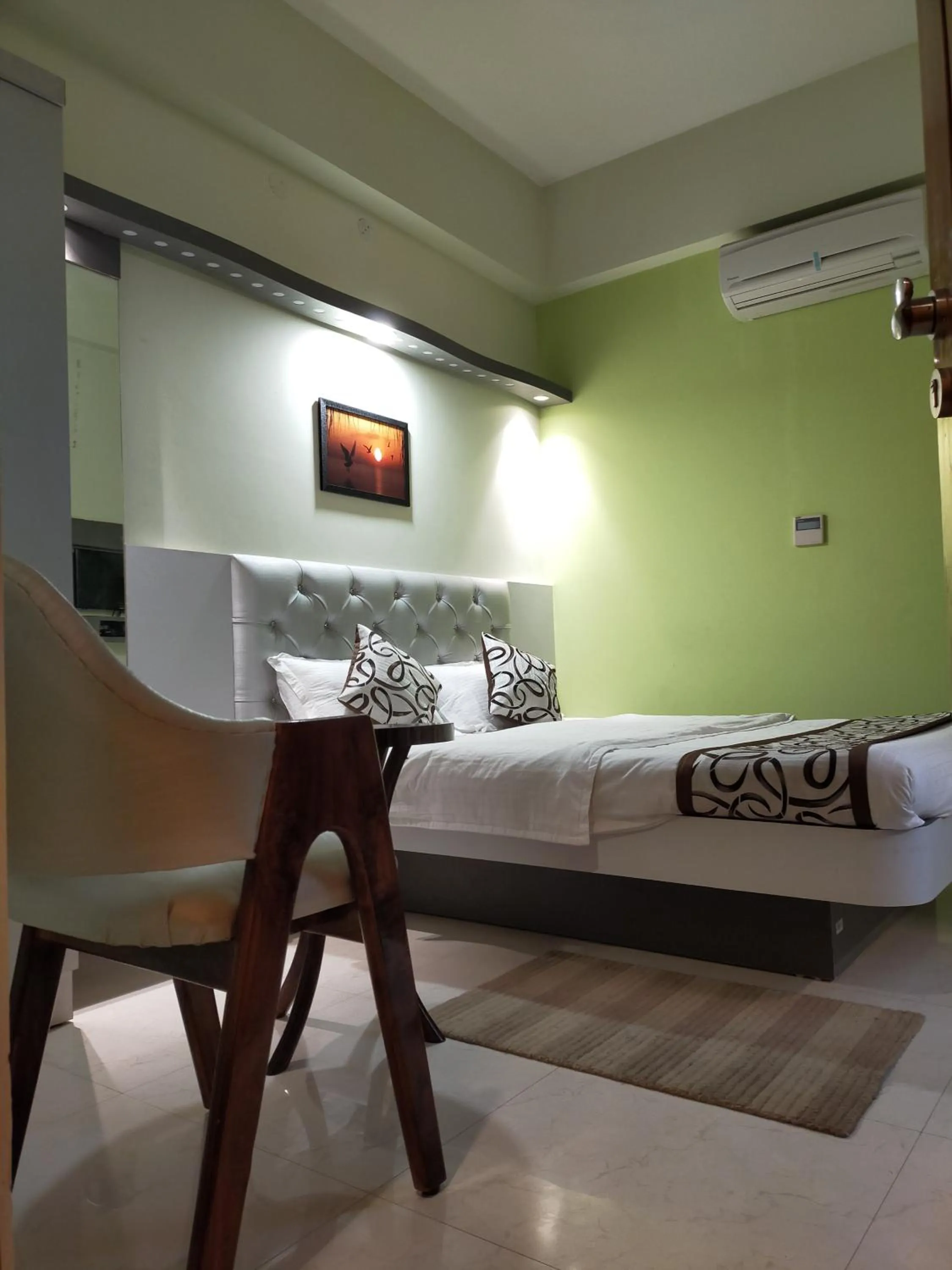 Bed in Hotel Prabhat