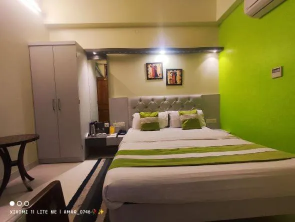 Bed in Hotel Prabhat