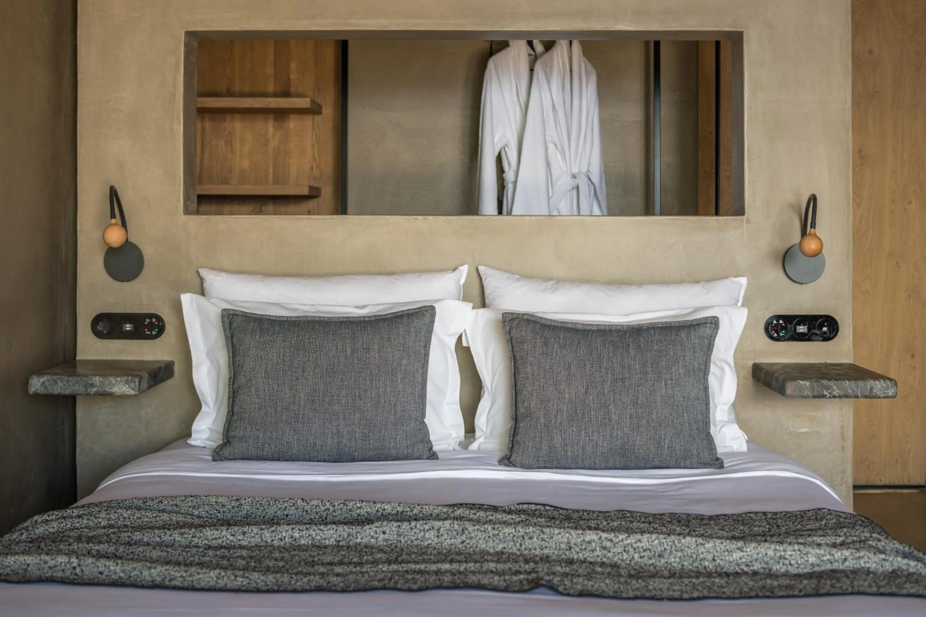 Bed in Acro Suites - A Wellbeing Resort