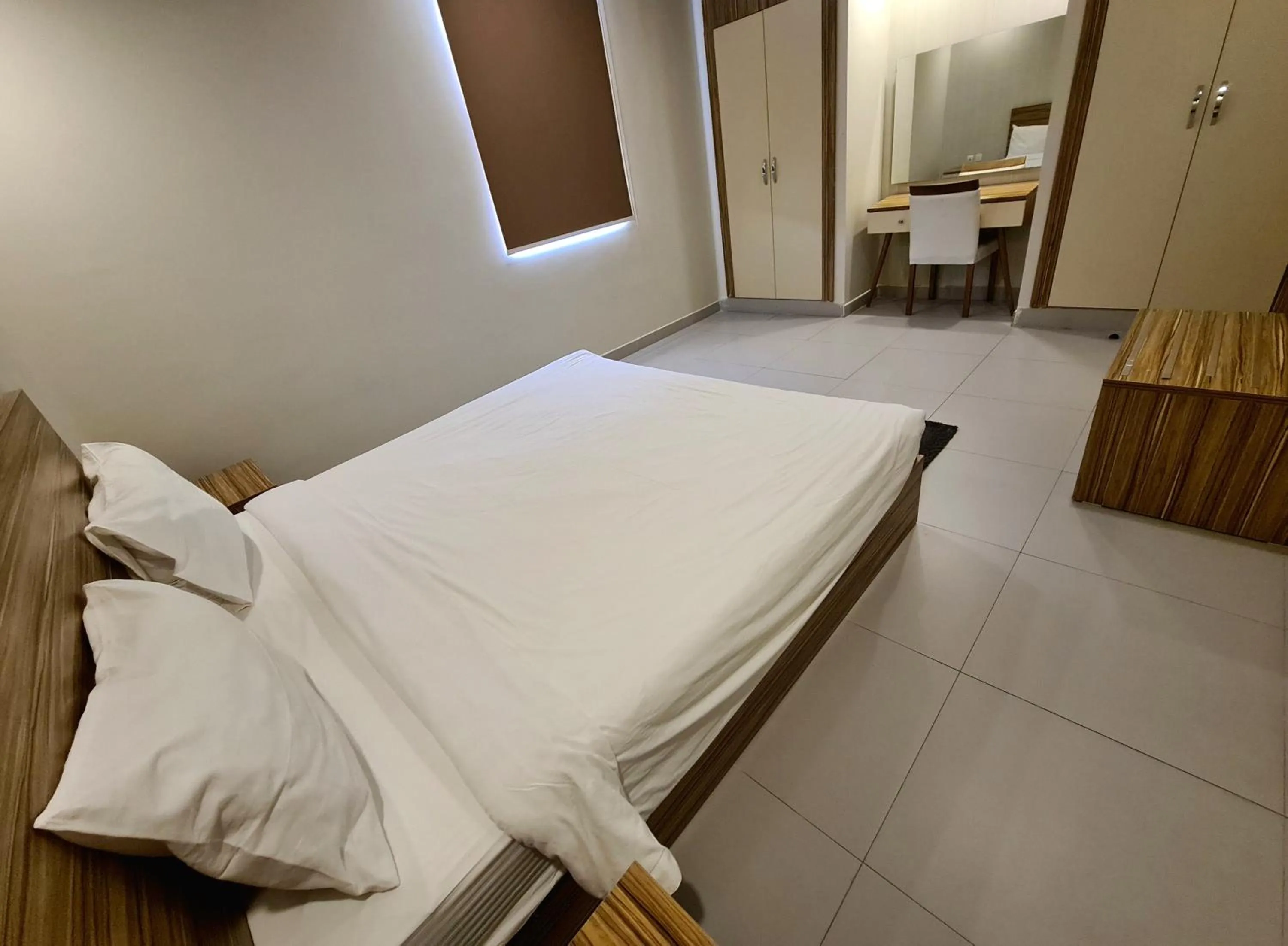 Bed in SPAR Serviced Apartments