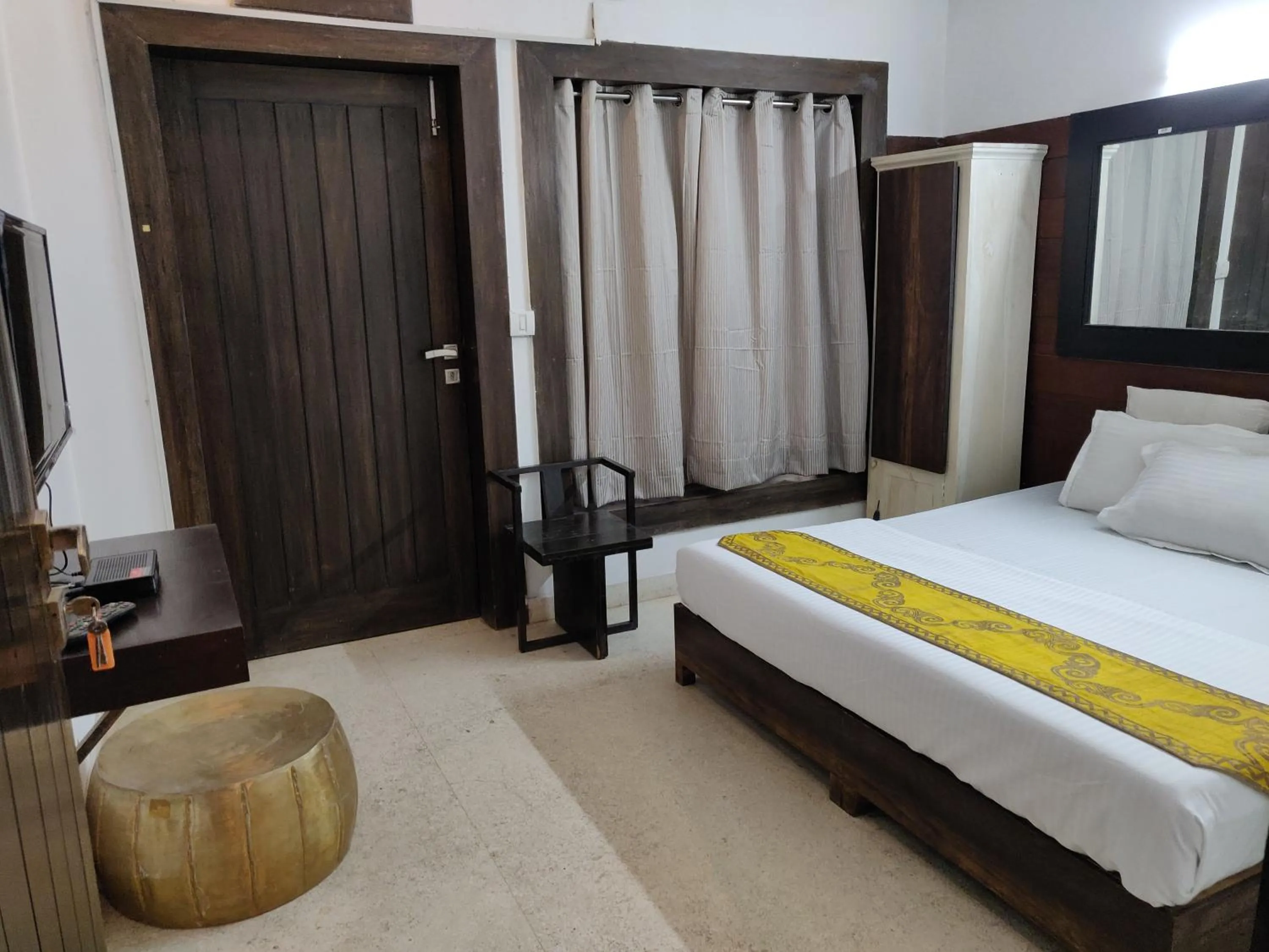 Photo of the whole room, Bed in Aakritii Hotels