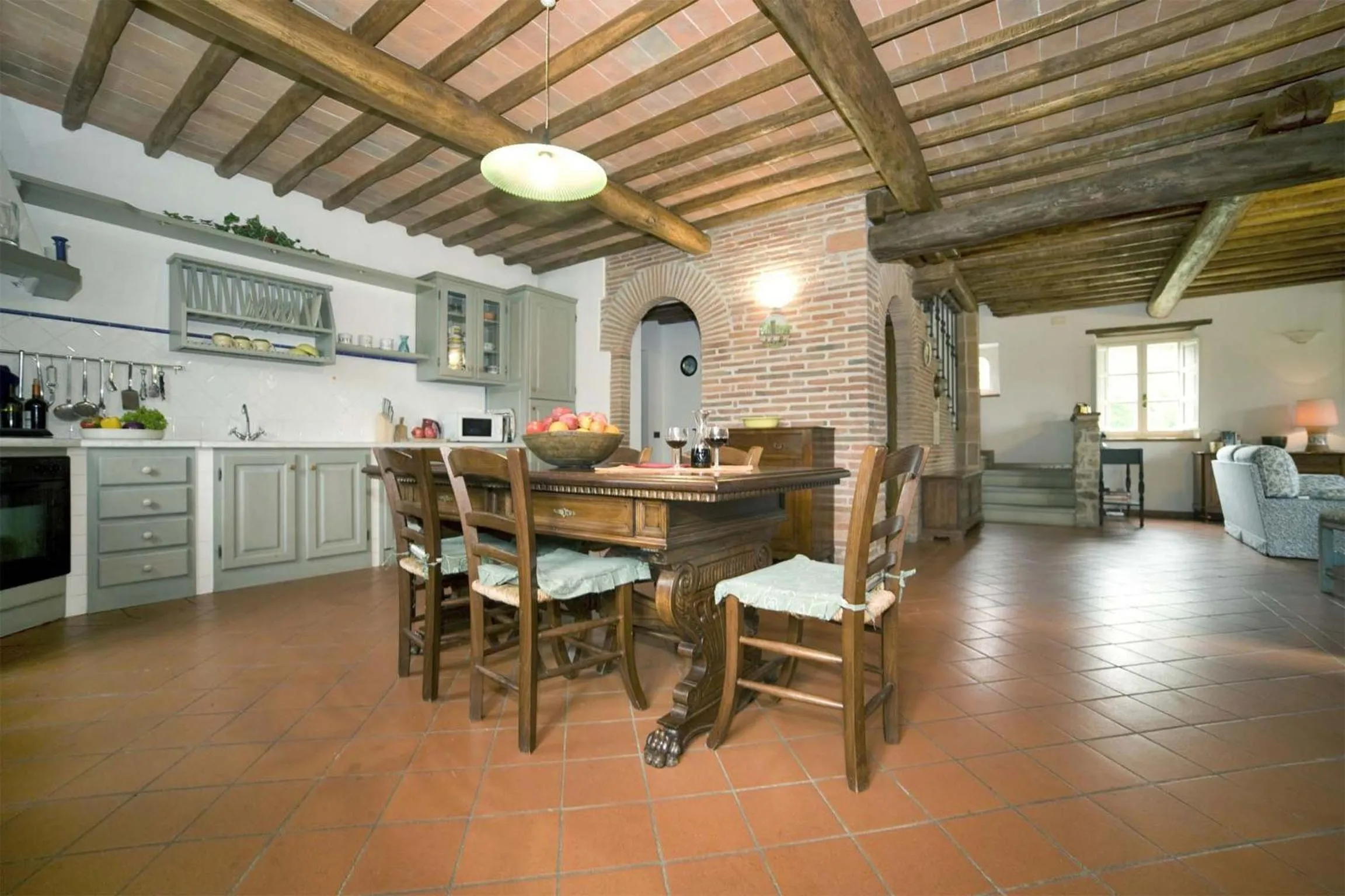 Kitchen or kitchenette in Broccolo by Salogi Villas
