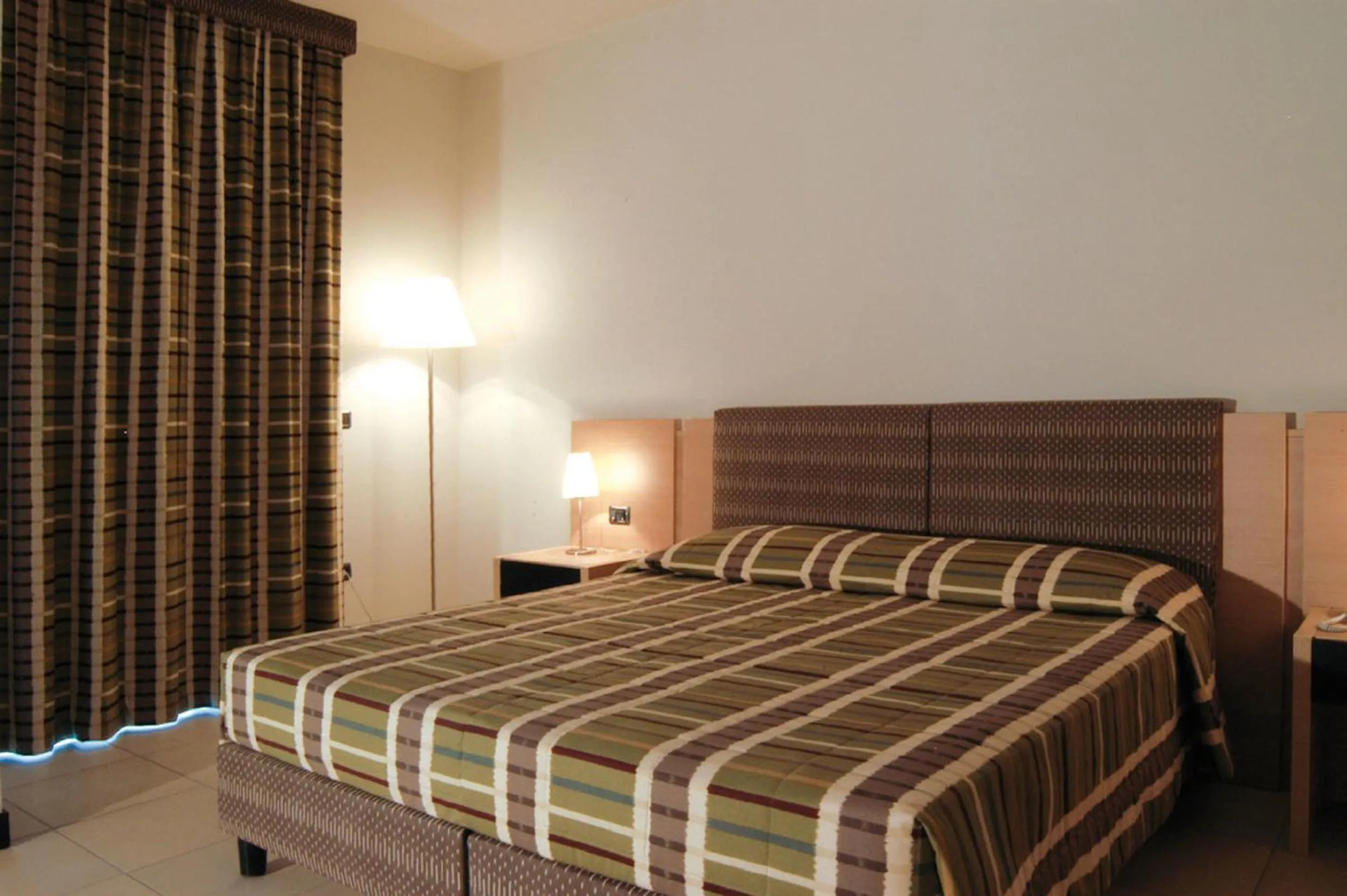 Bedroom, Bed in Hotel Santo Stefano