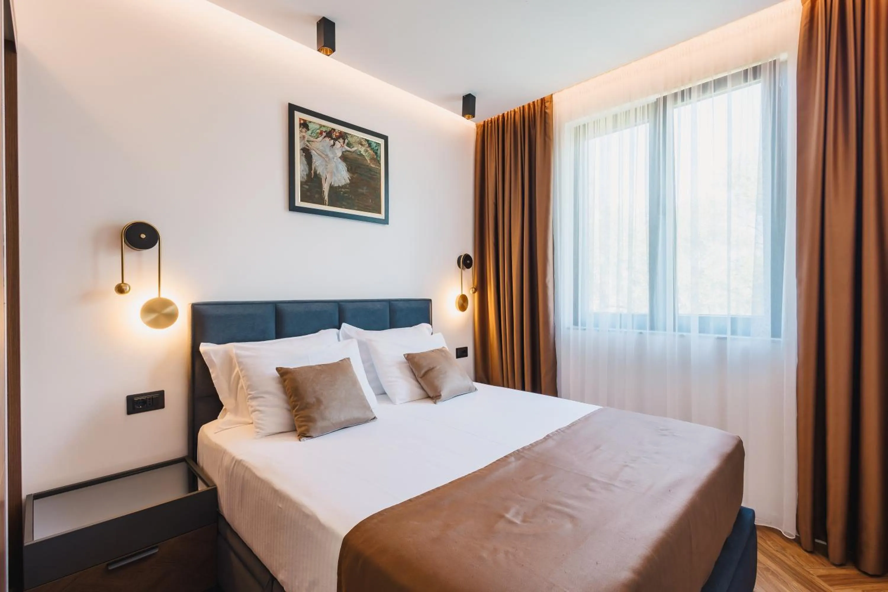 Bed in Giardino Lux Apartments