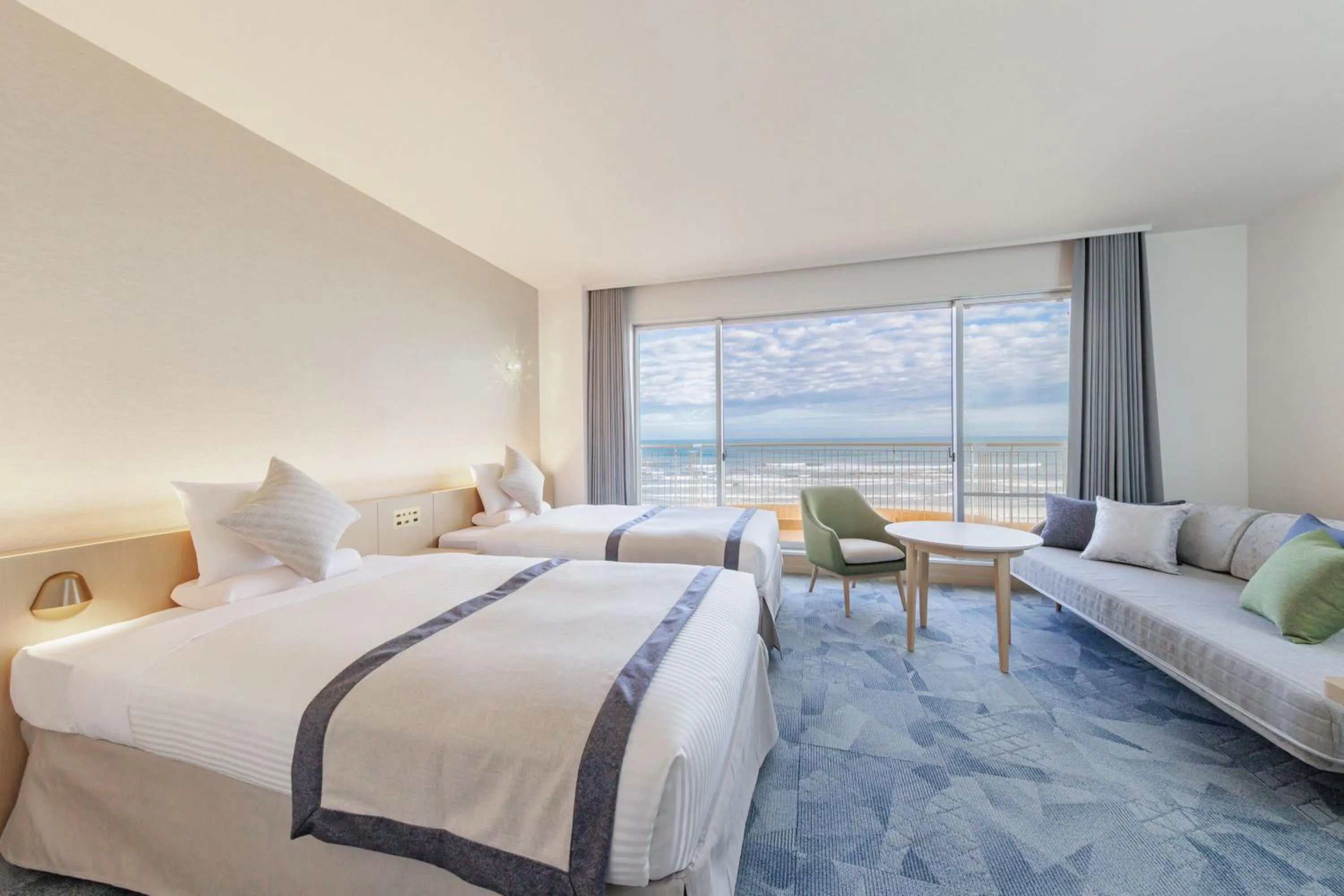 Bed in KAMENOI HOTEL Kujukuri