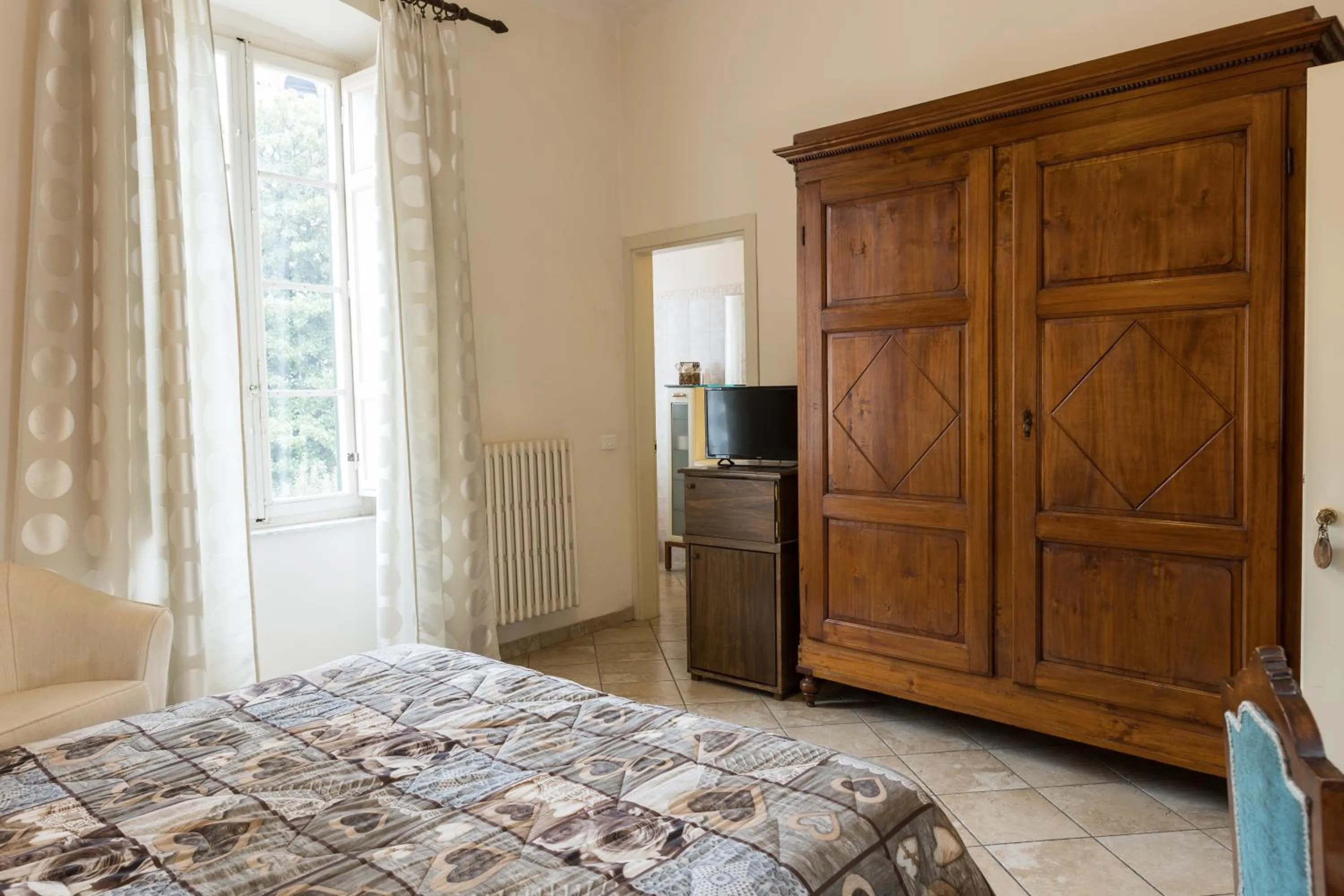 Photo of the whole room, Bed in Locanda dei Fiori