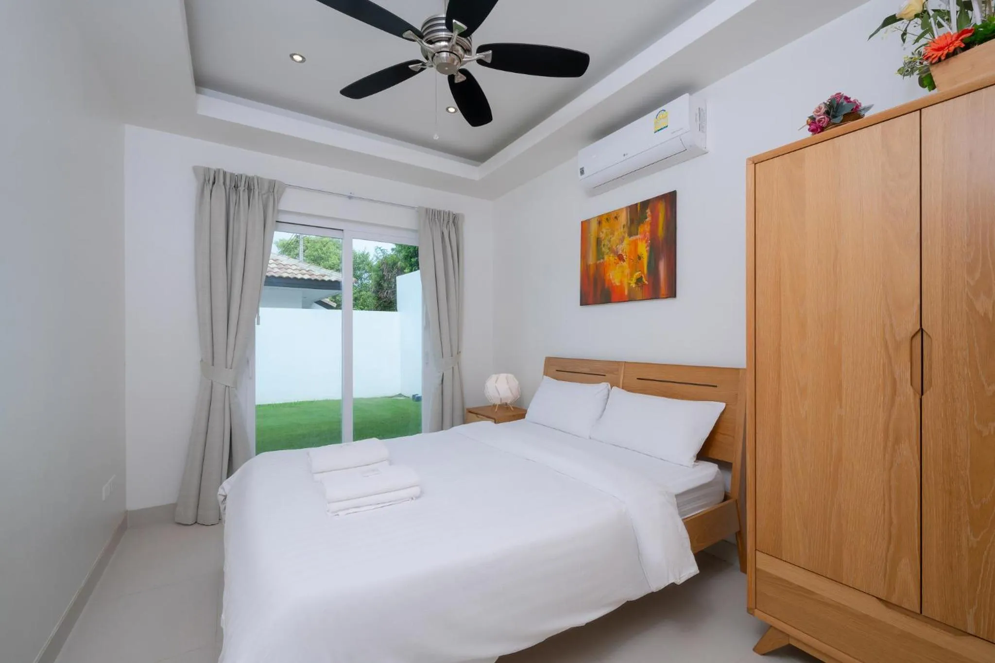 Bedroom, Bed in Orchid Paradise Homes 313