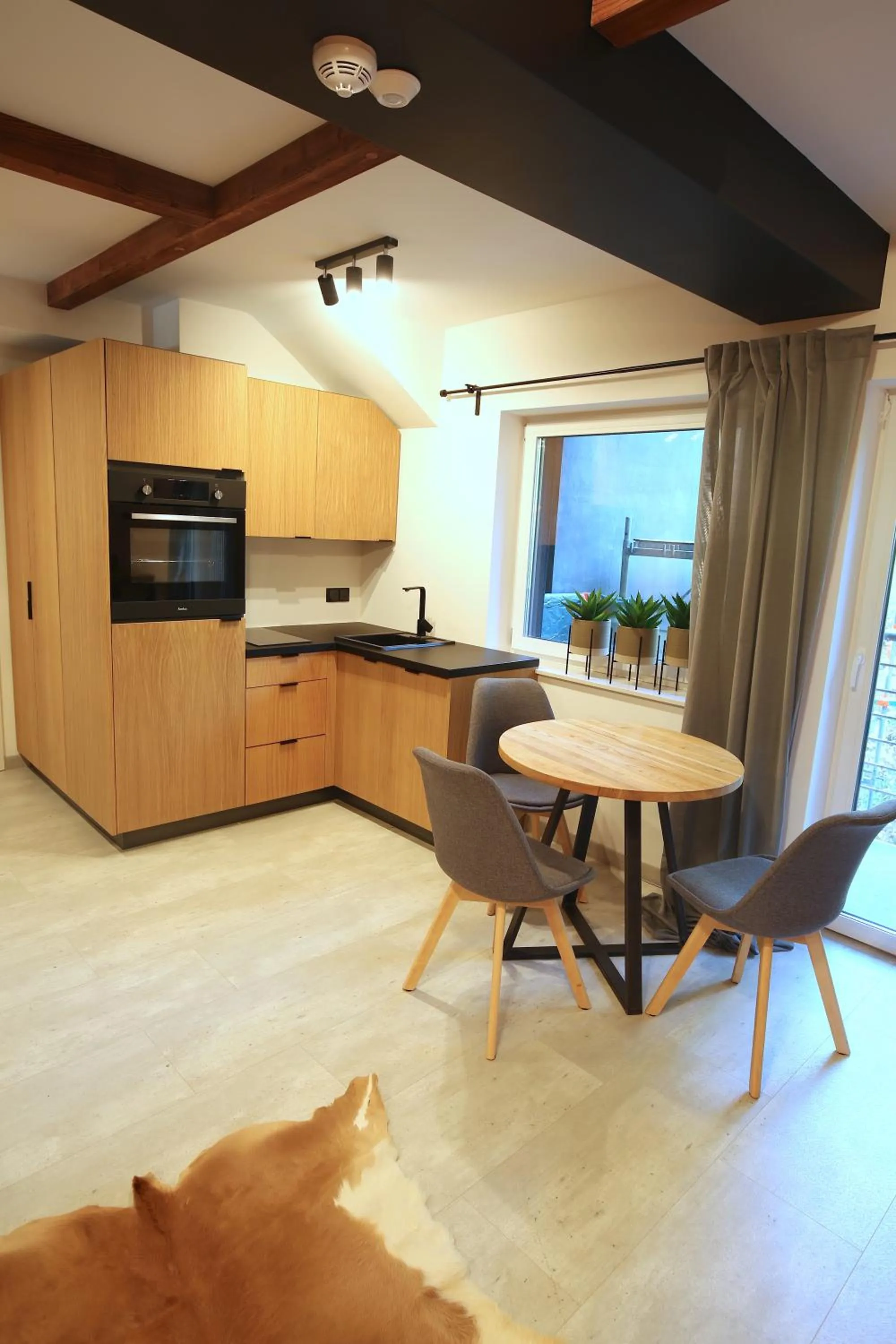 Kitchen or kitchenette in Aparthotel Narciarska 2