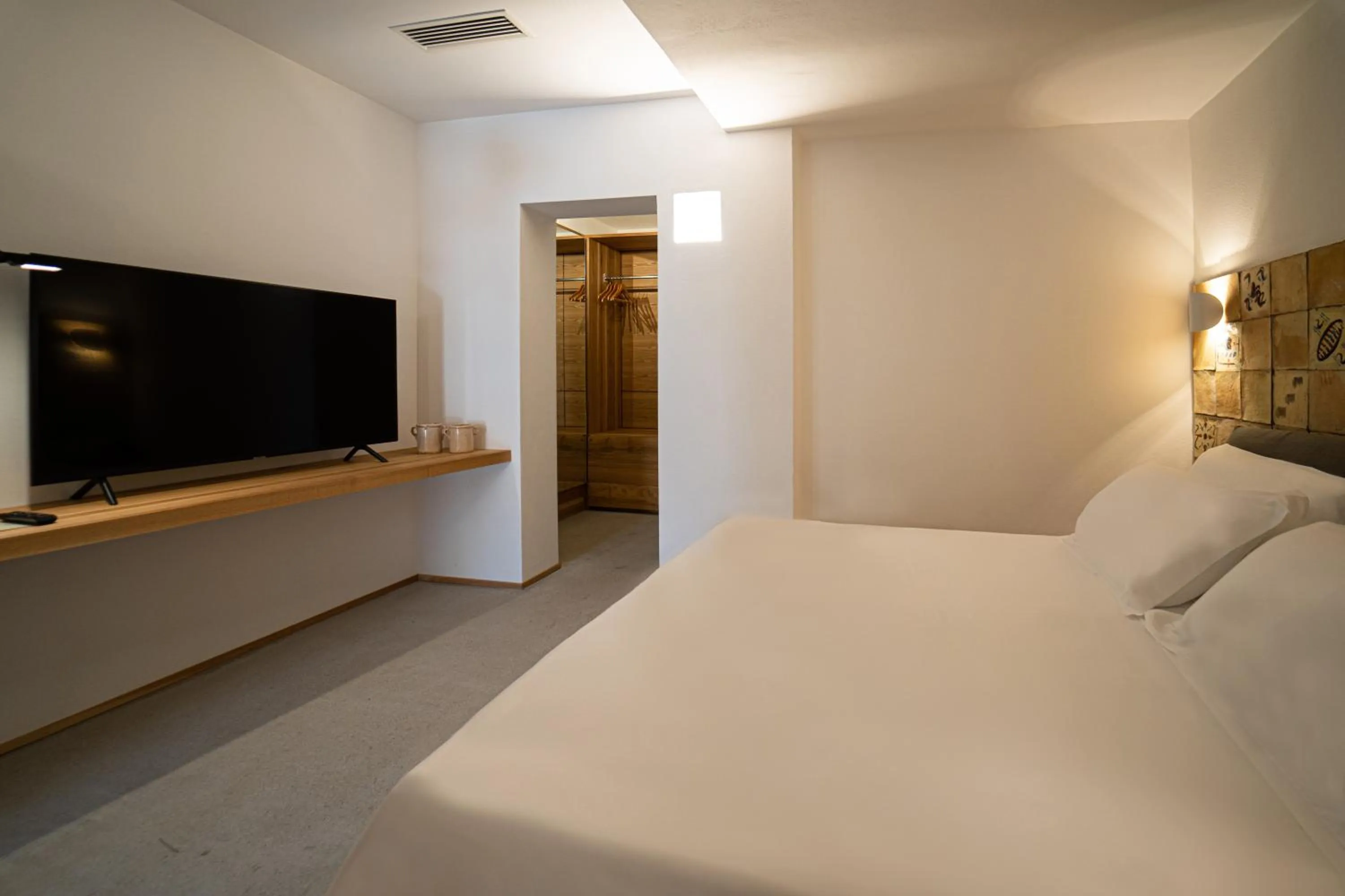 Bed in Praia Art Resort - Small Luxury Hotels of the world