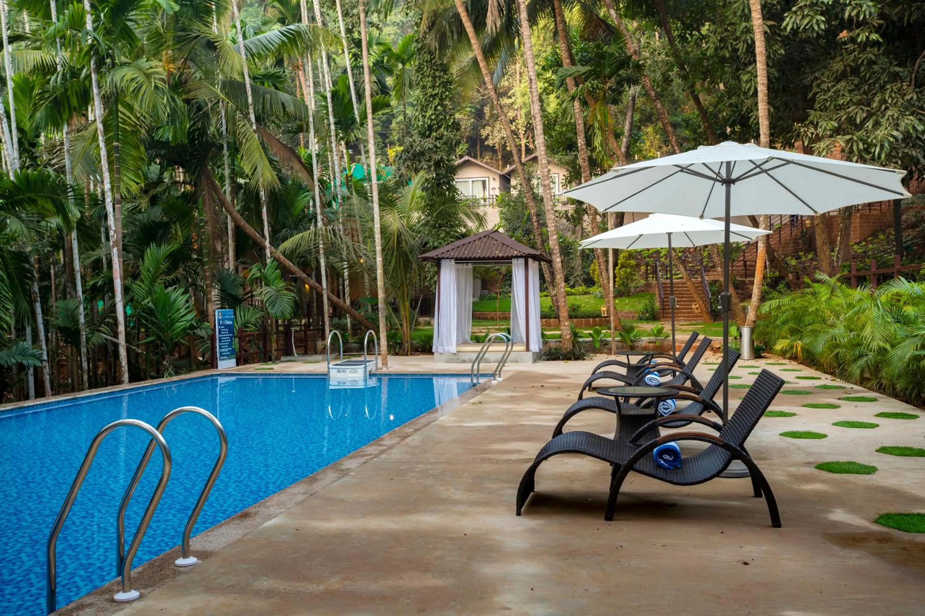 Swimming pool in Stone Wood Premier Gokarna