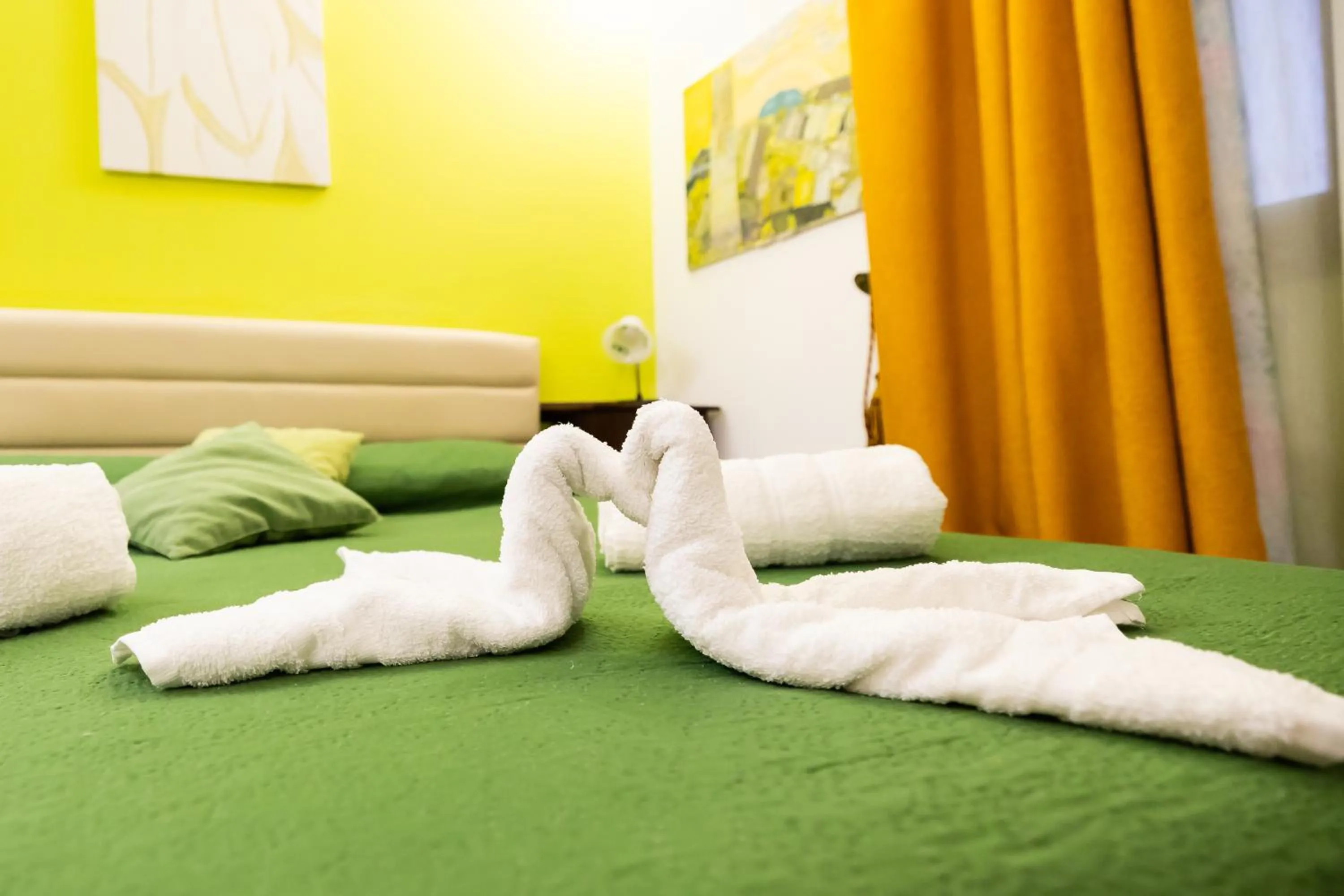 towels, Bed in B&B Villa Anna