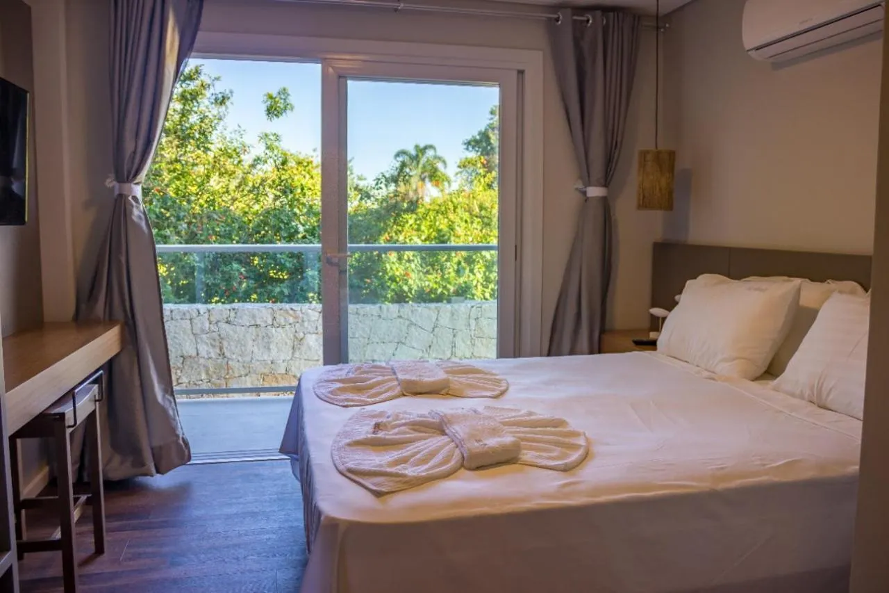 Bed in Pousada Las Piedras