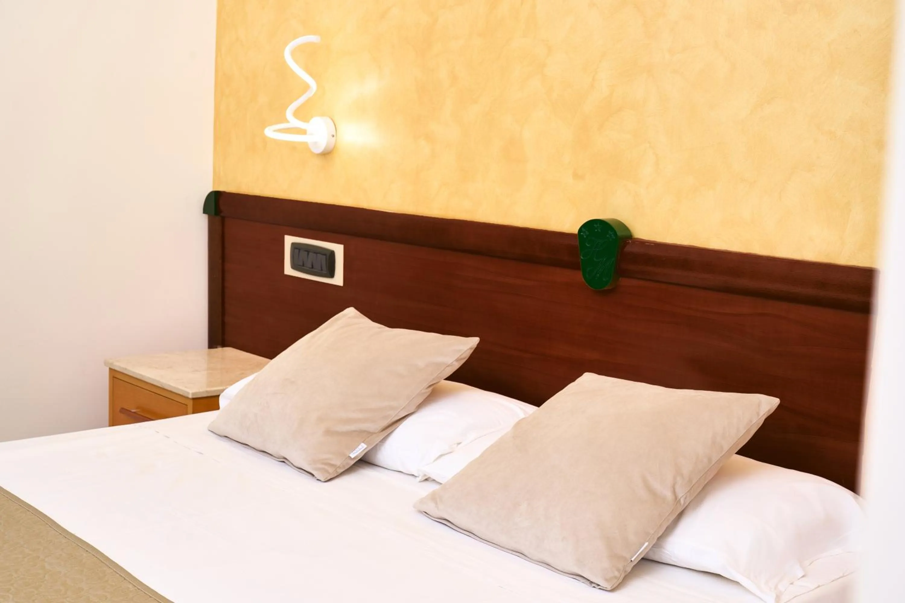 Bed in Hotel Miramare