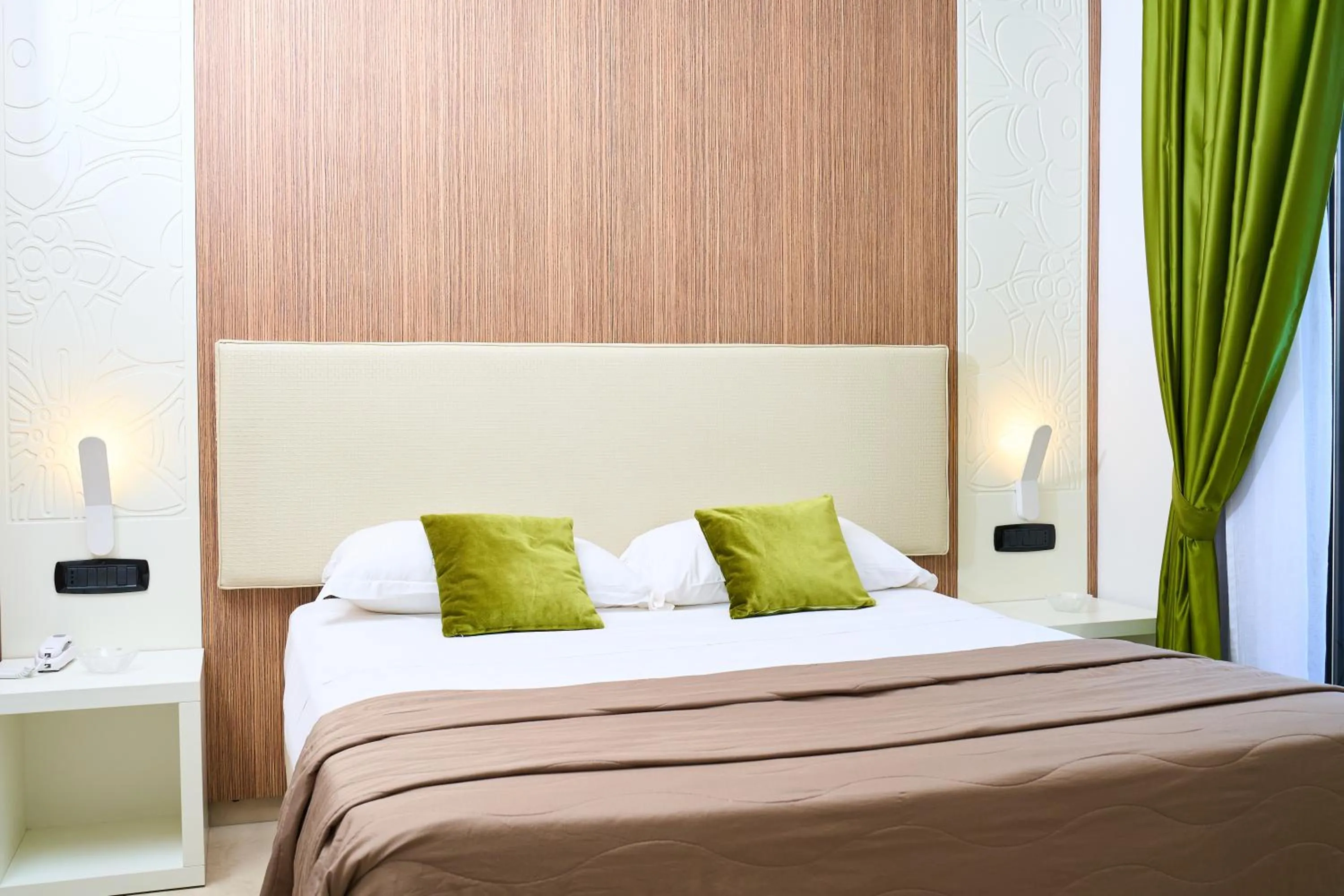 Bed in Hotel Miramare