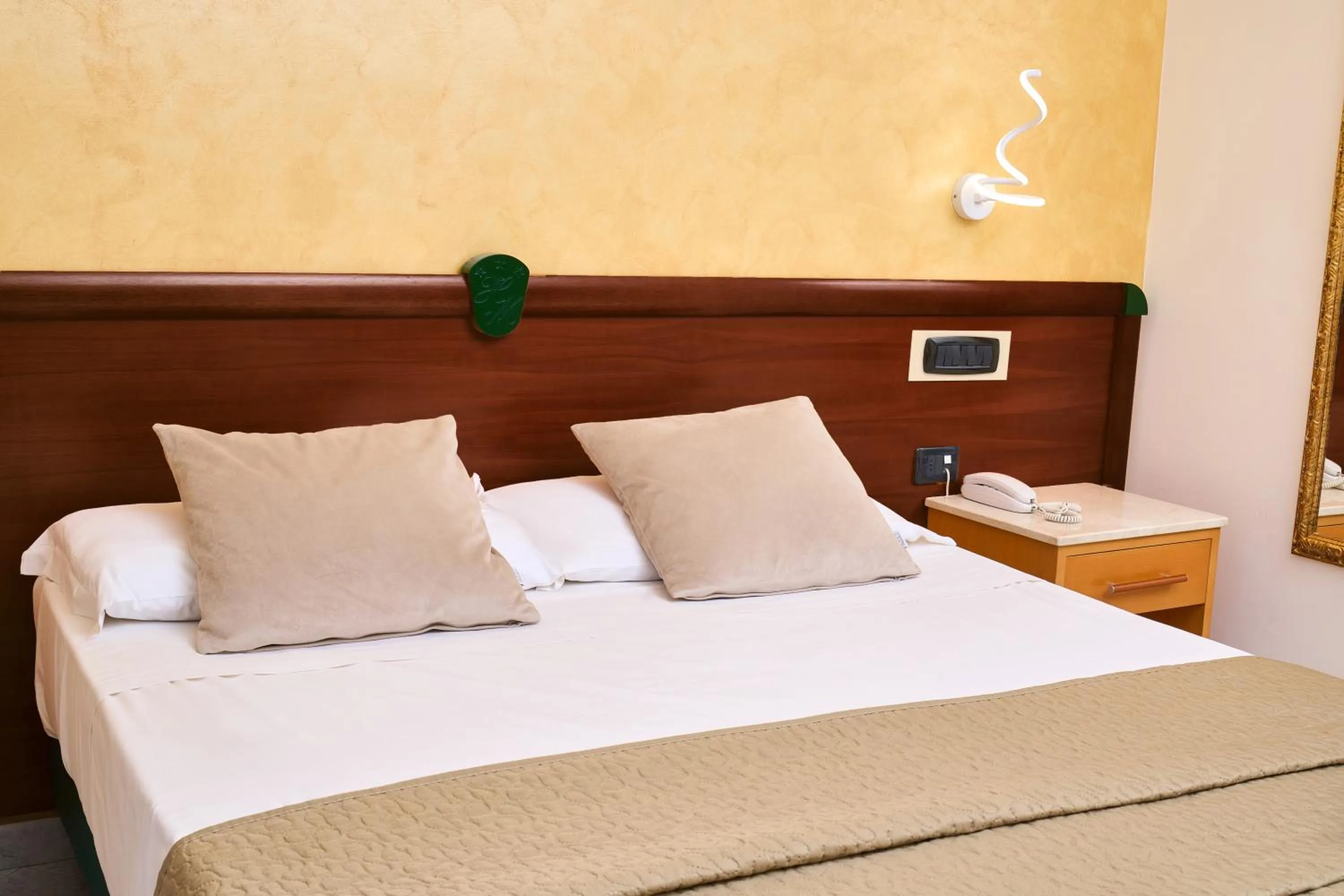 Bed in Hotel Miramare