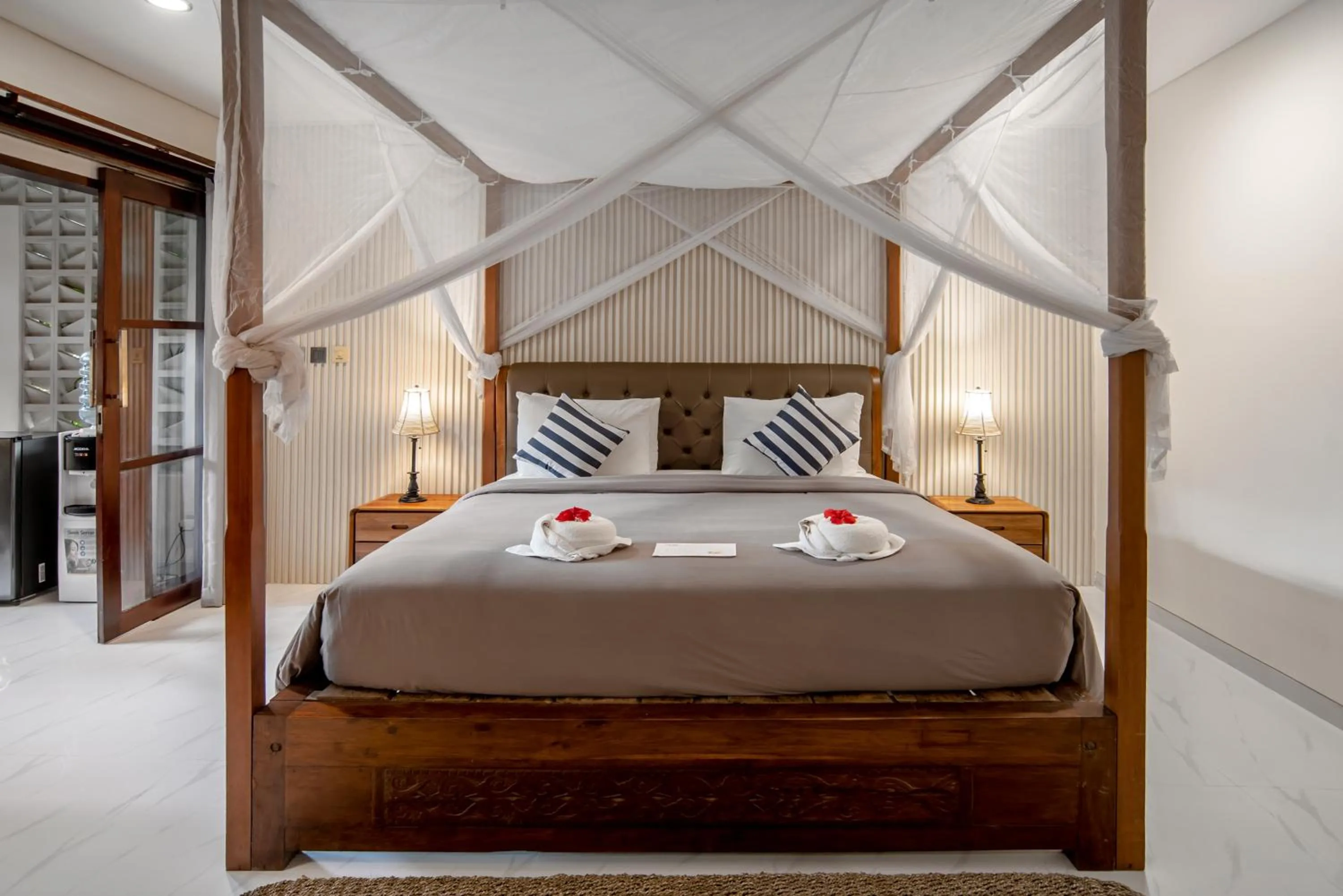 Bed in PNB Bali Villas