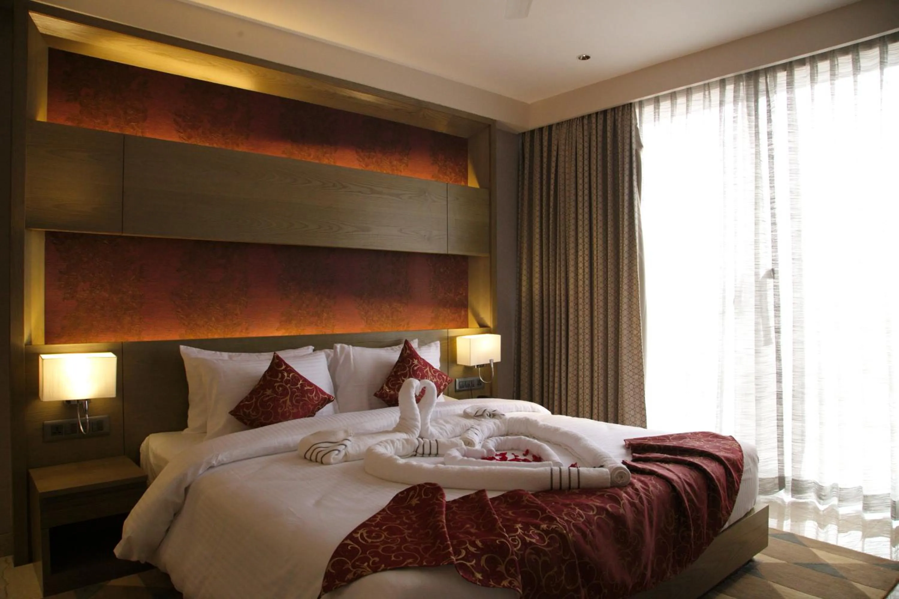 Bed in Hotel Grand Kadamba