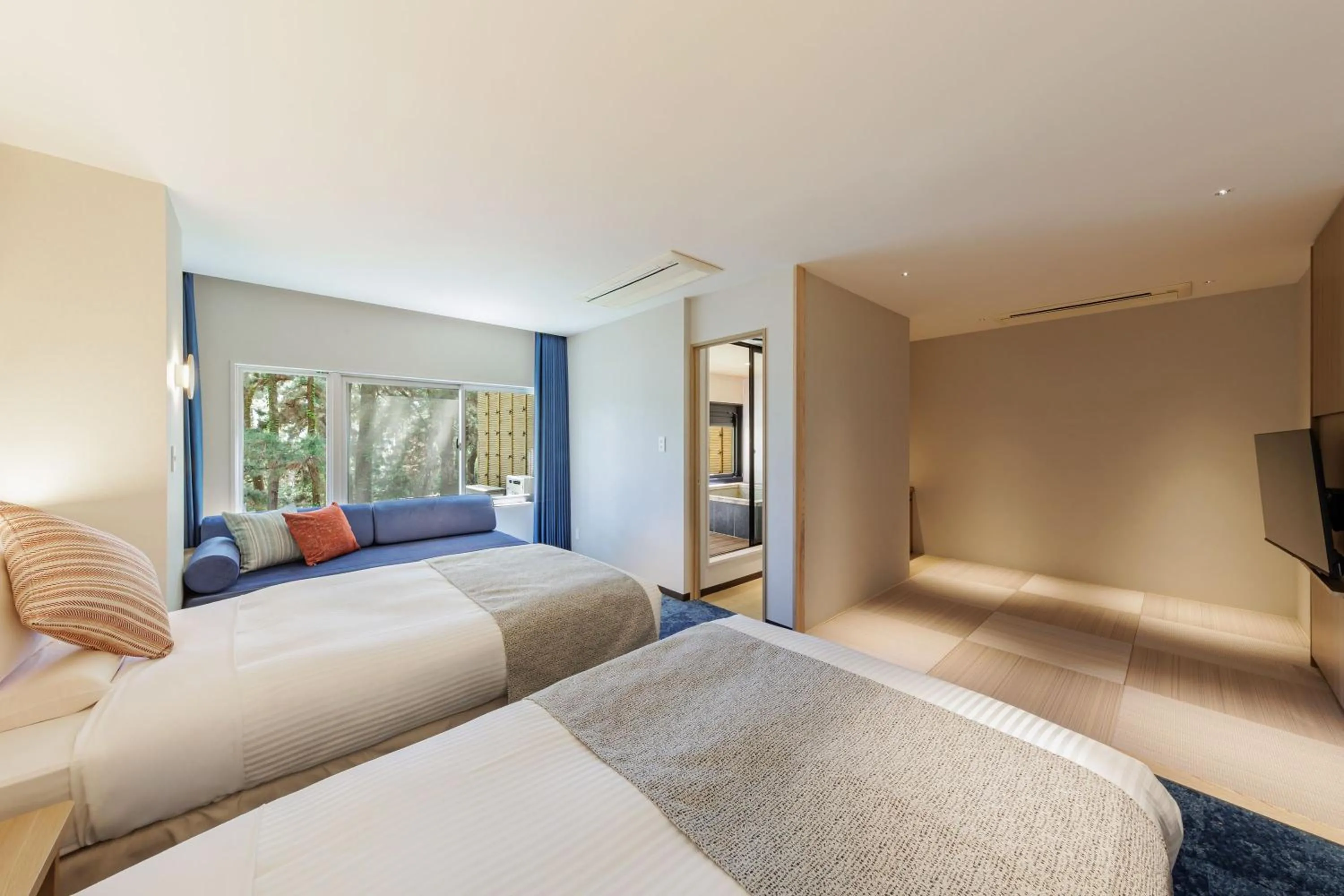 Bed in KAMENOI HOTEL Kamogawa