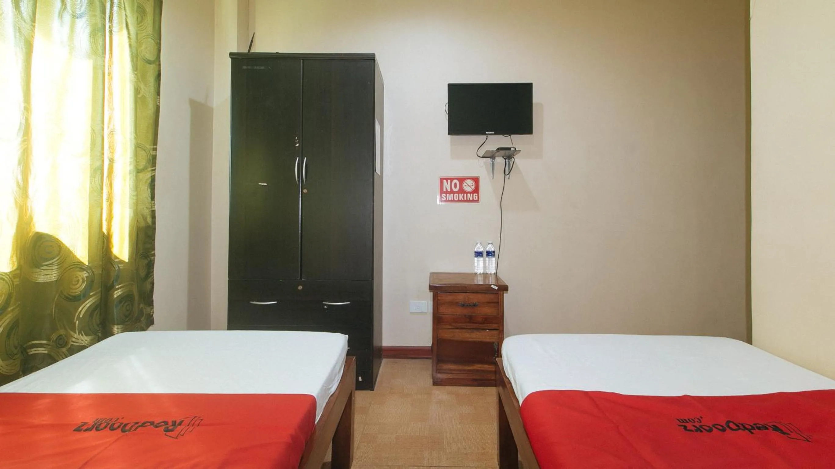Bed in RedDoorz near Talisay District Hospital