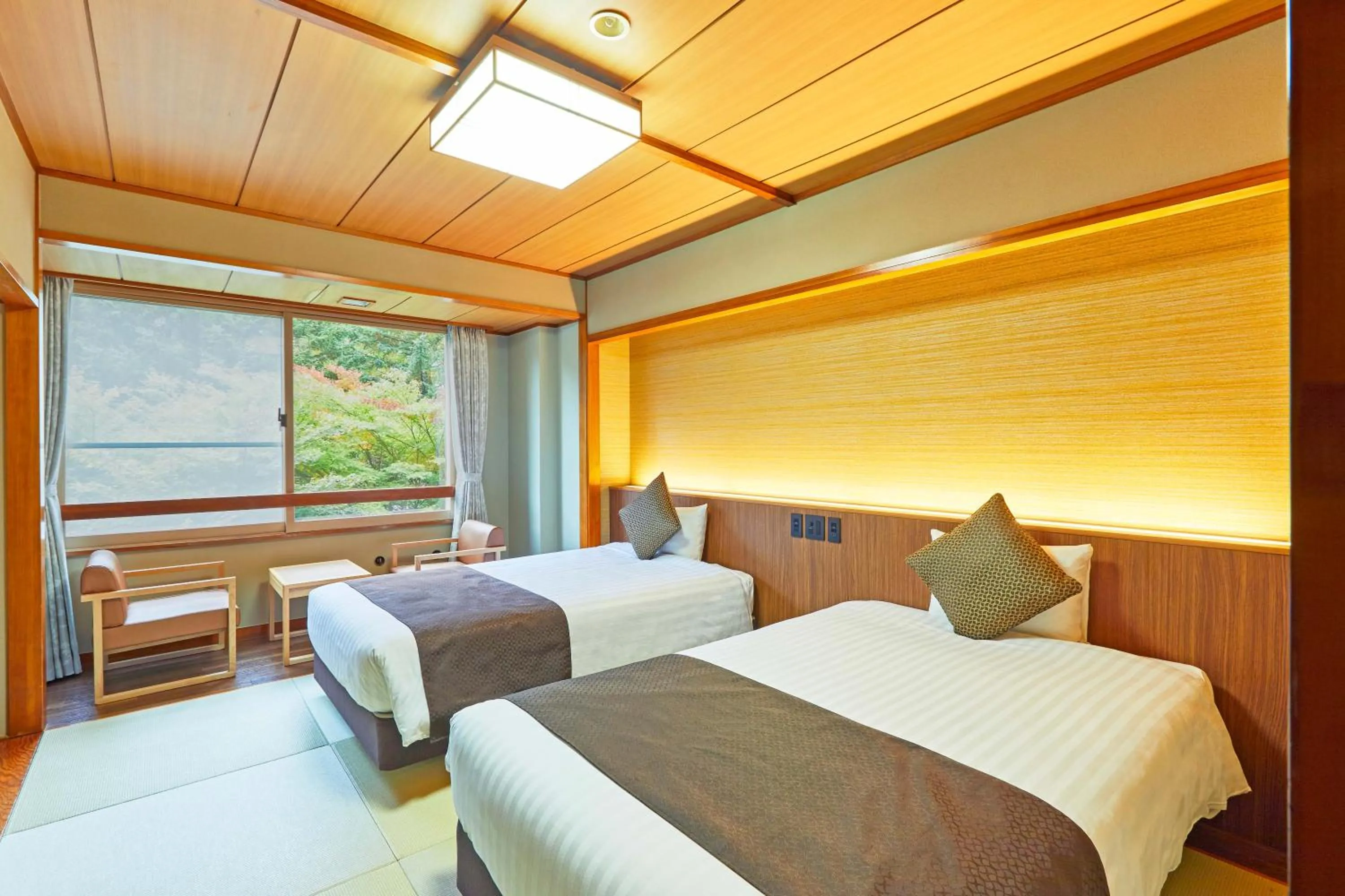 Photo of the whole room, Bed in KAMENOI HOTEL SHIOBARA Dog Friendly Hotel