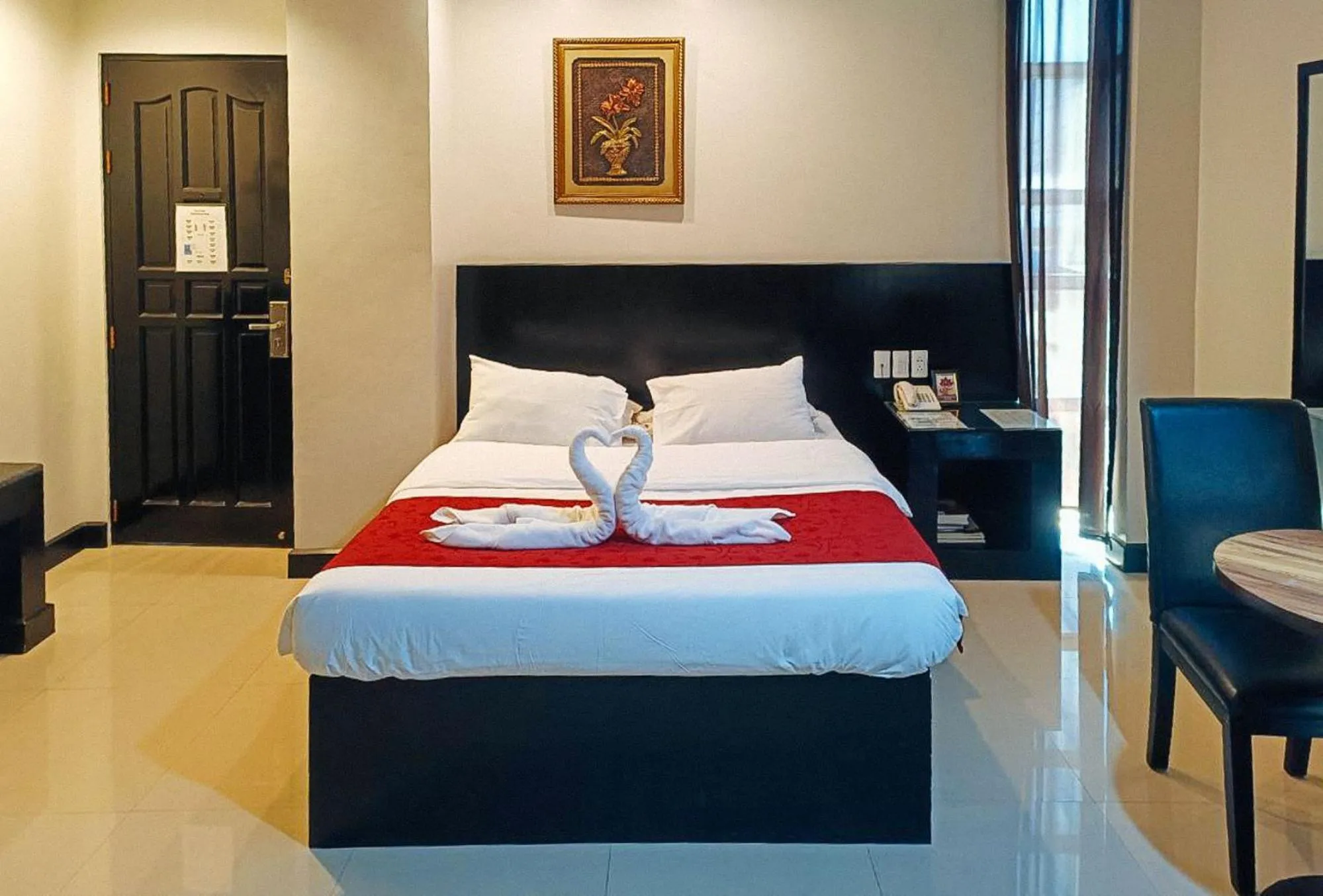 Bed in Check Inn Hotel Dumaguete City by RedDoorz