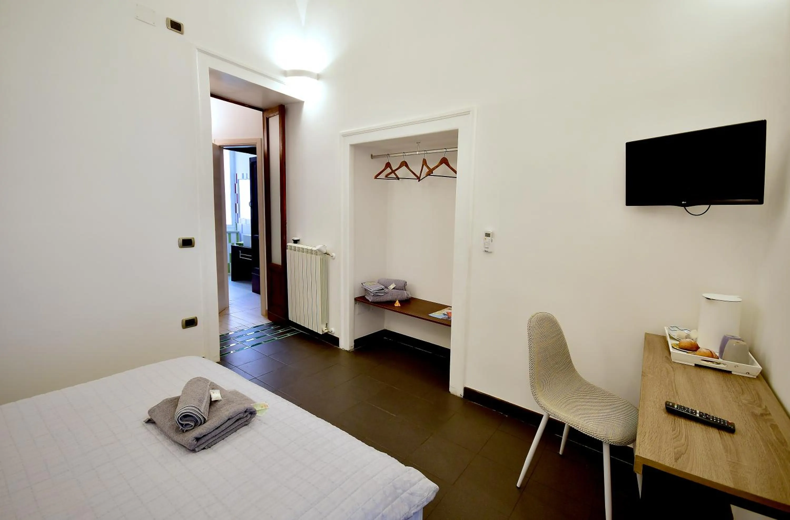Photo of the whole room, Bed in Di affreschi e volte